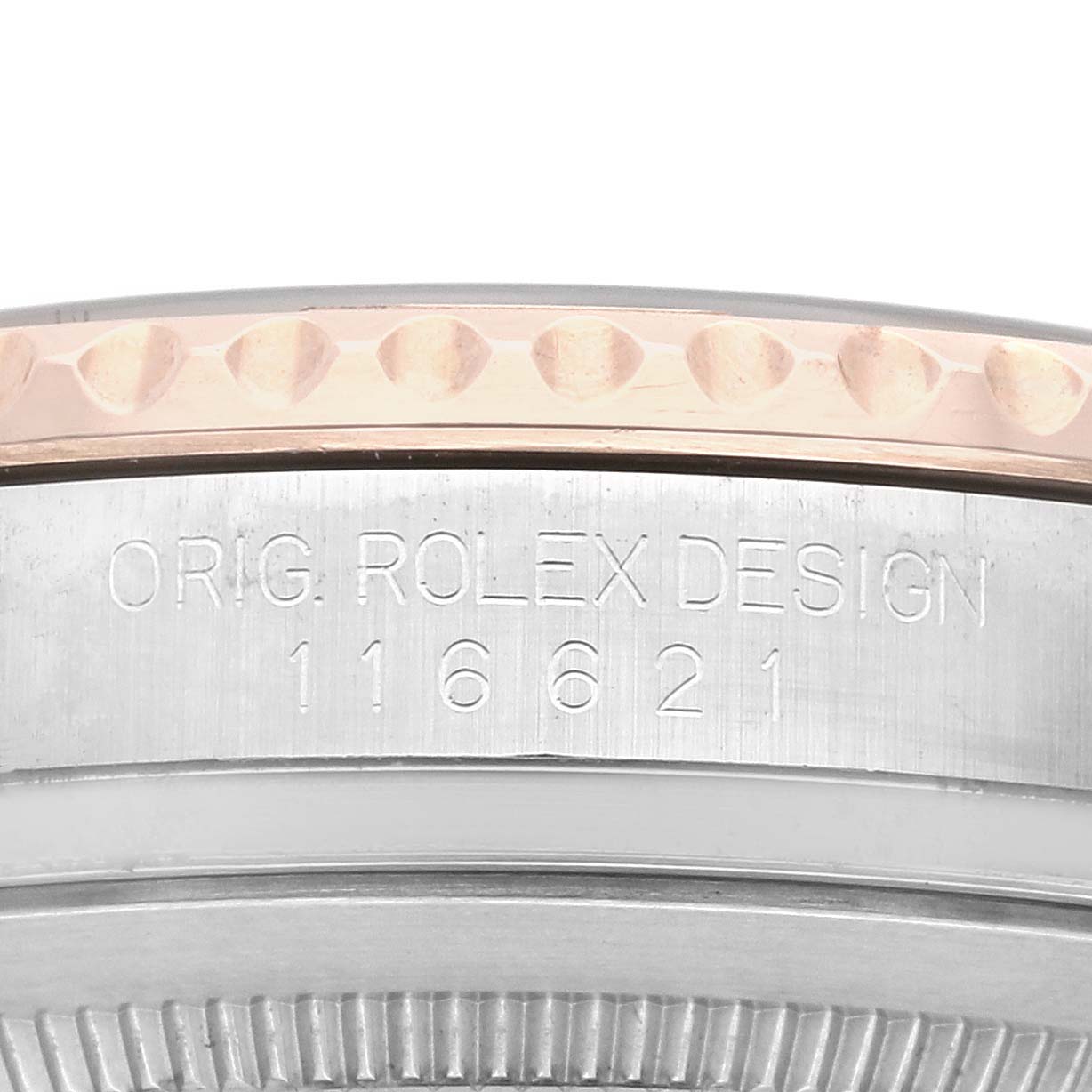 The image shows a side view of the Rolex Yacht-Master 116621 Men's Steel and Gold (two tone) Brown Dial 116621 Men's Steel and Gold (two tone) Brown Dial's bezel and engraved reference number 116621.