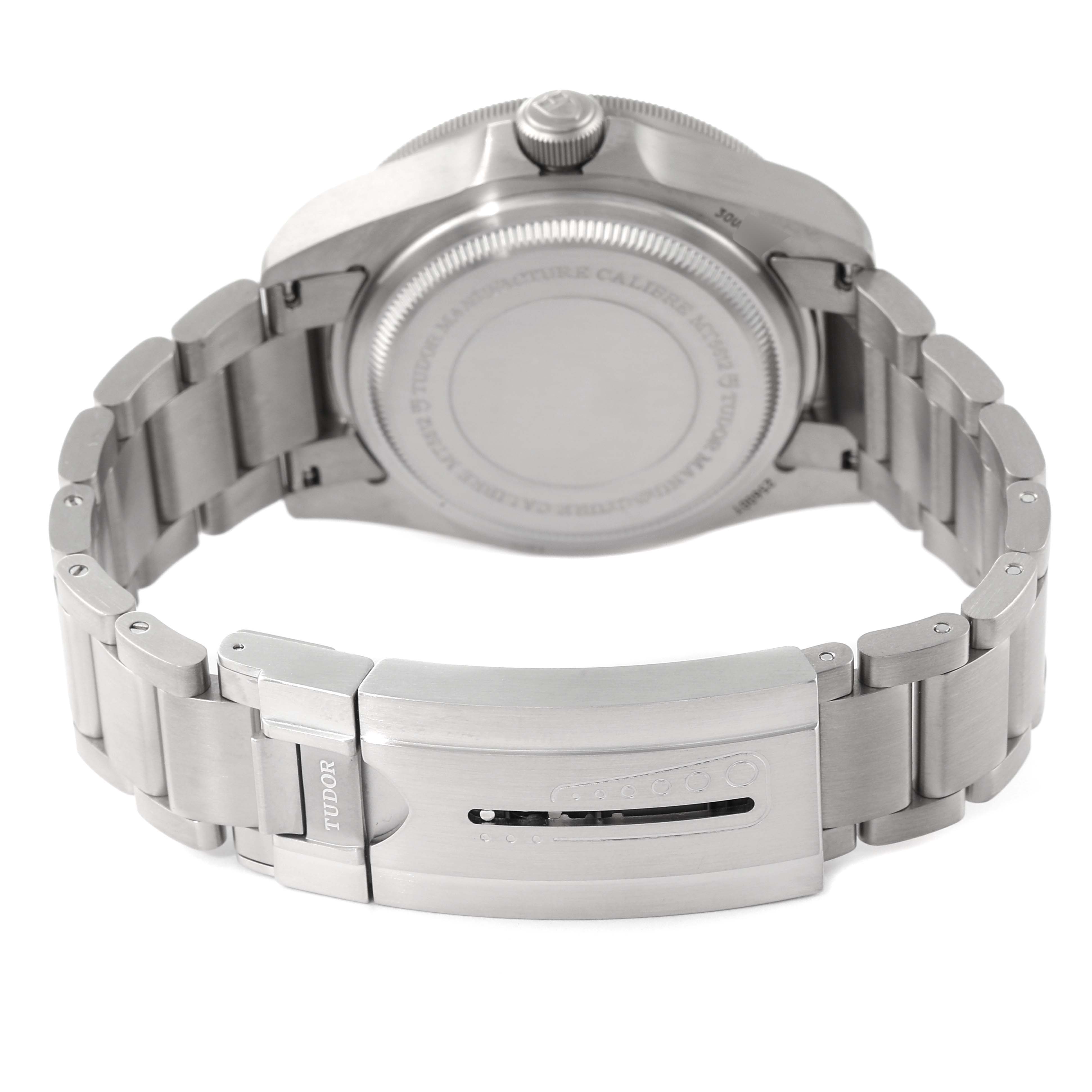 The Tudor Pelagos 25600TN Men
s Titanium Black Dial 25600TN Men
s Titanium Black Dial watch is shown from the back, highlighting its clasp, bracelet, and case back.