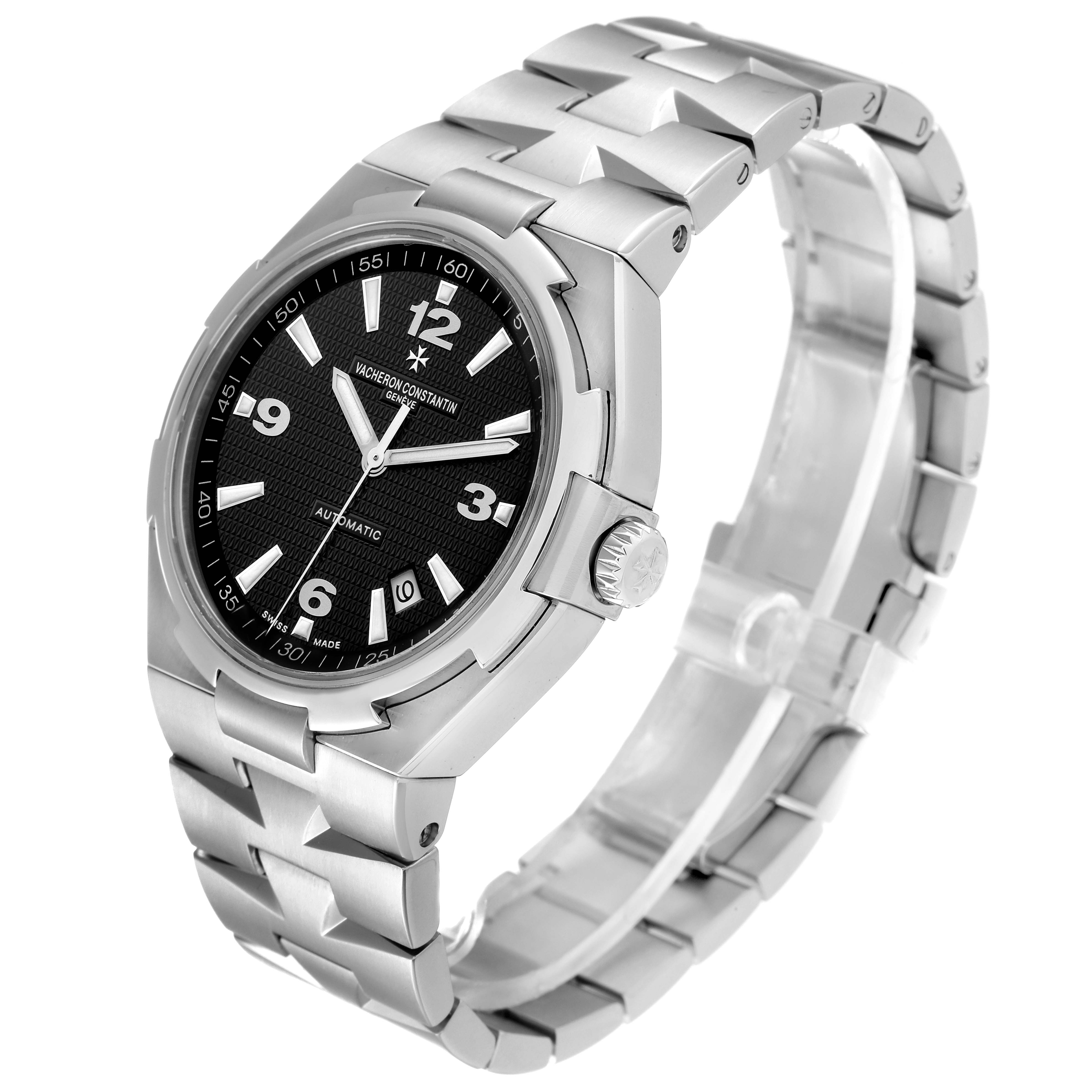 The image shows a Vacheron Constantin Overseas 47040/B01A-9094 Men's Stainless Steel Black Dial 47040/B01A-9094 Men's Stainless Steel Black Dial model watch at a slight angle, displaying the dial, crown, and bracelet.