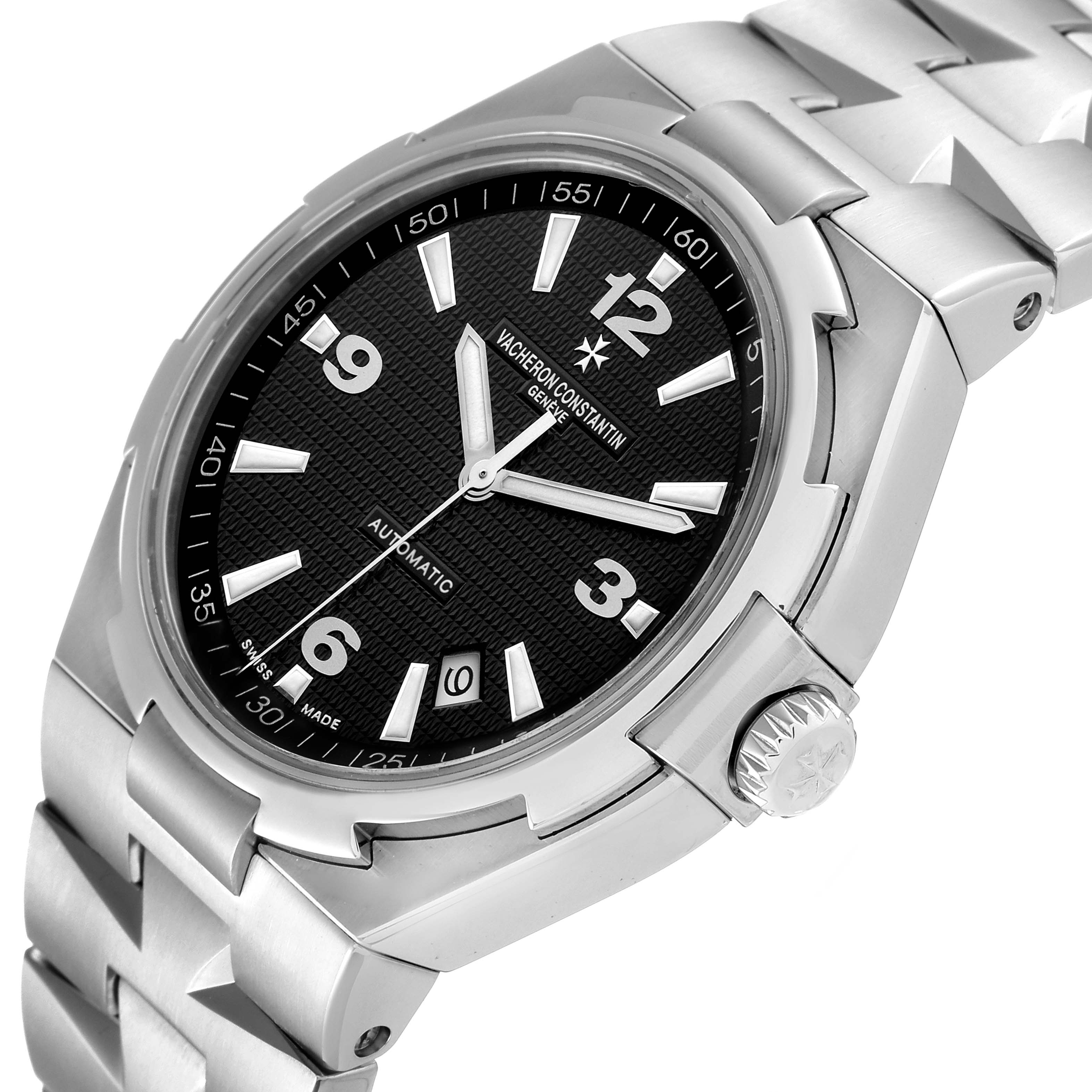 This image shows a Vacheron Constantin Overseas 47040/B01A-9094 Men's Stainless Steel Black Dial 47040/B01A-9094 Men's Stainless Steel Black Dial model watch at a three-quarter angle, highlighting the dial, crown, and bracelet.