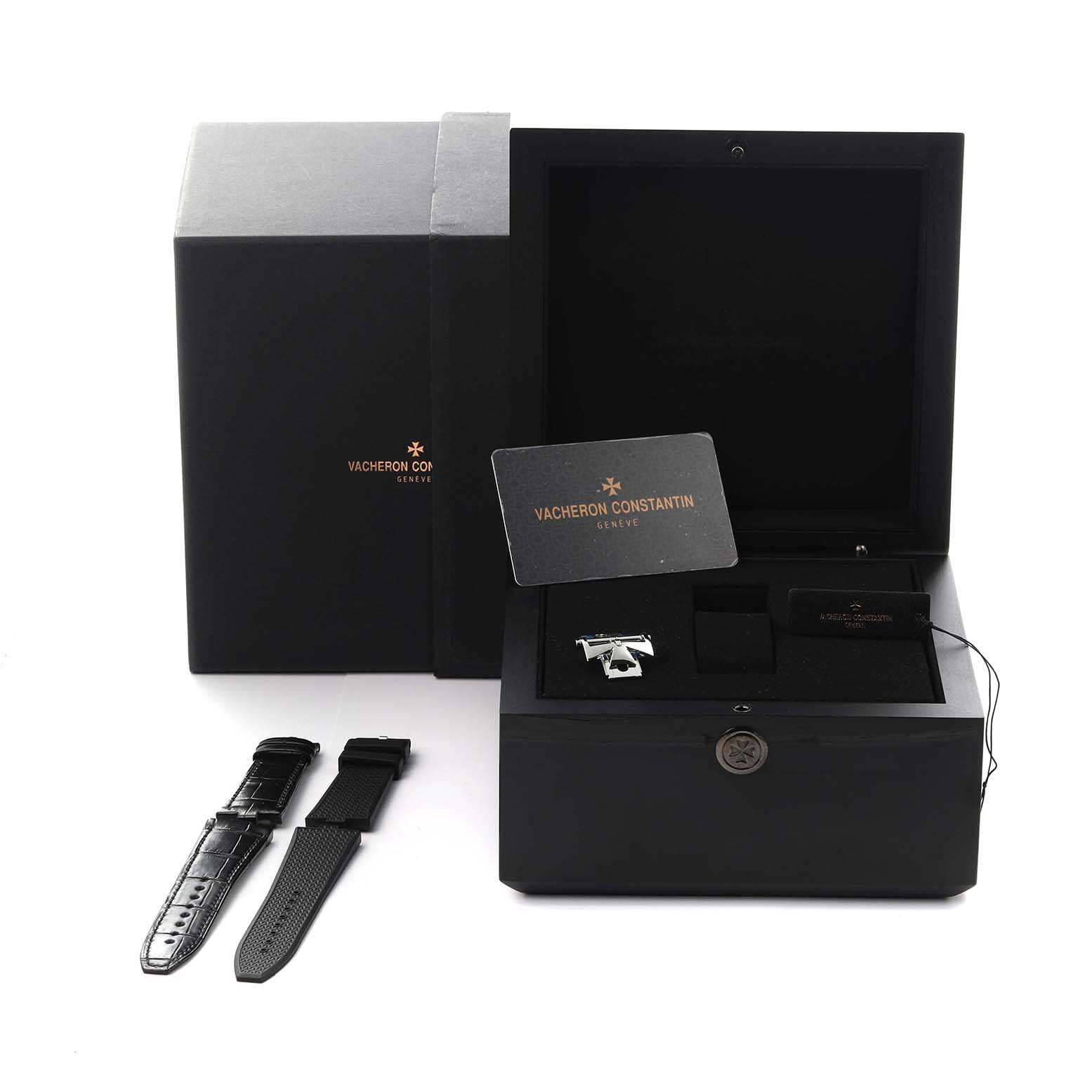 The image shows the Vacheron Constantin Overseas 7900V/110A-B333 Men's Stainless Steel Silver Dial 7900V/110A-B333 Men's Stainless Steel Silver Dial model packaging, with additional straps and a booklet in an open box.