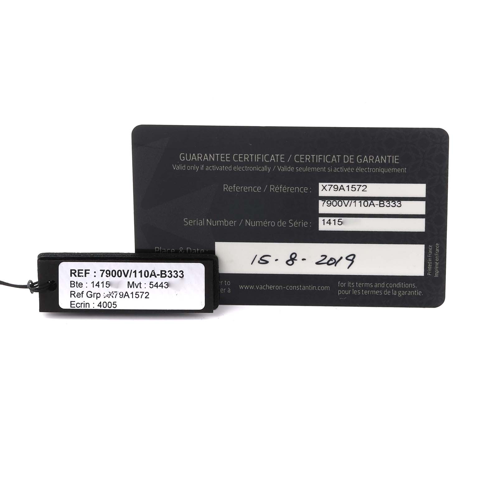 The image shows a warranty card and tag for the Vacheron Constantin Overseas 7900V/110A-B333 Men's Stainless Steel Silver Dial 7900V/110A-B333 Men's Stainless Steel Silver Dial model.