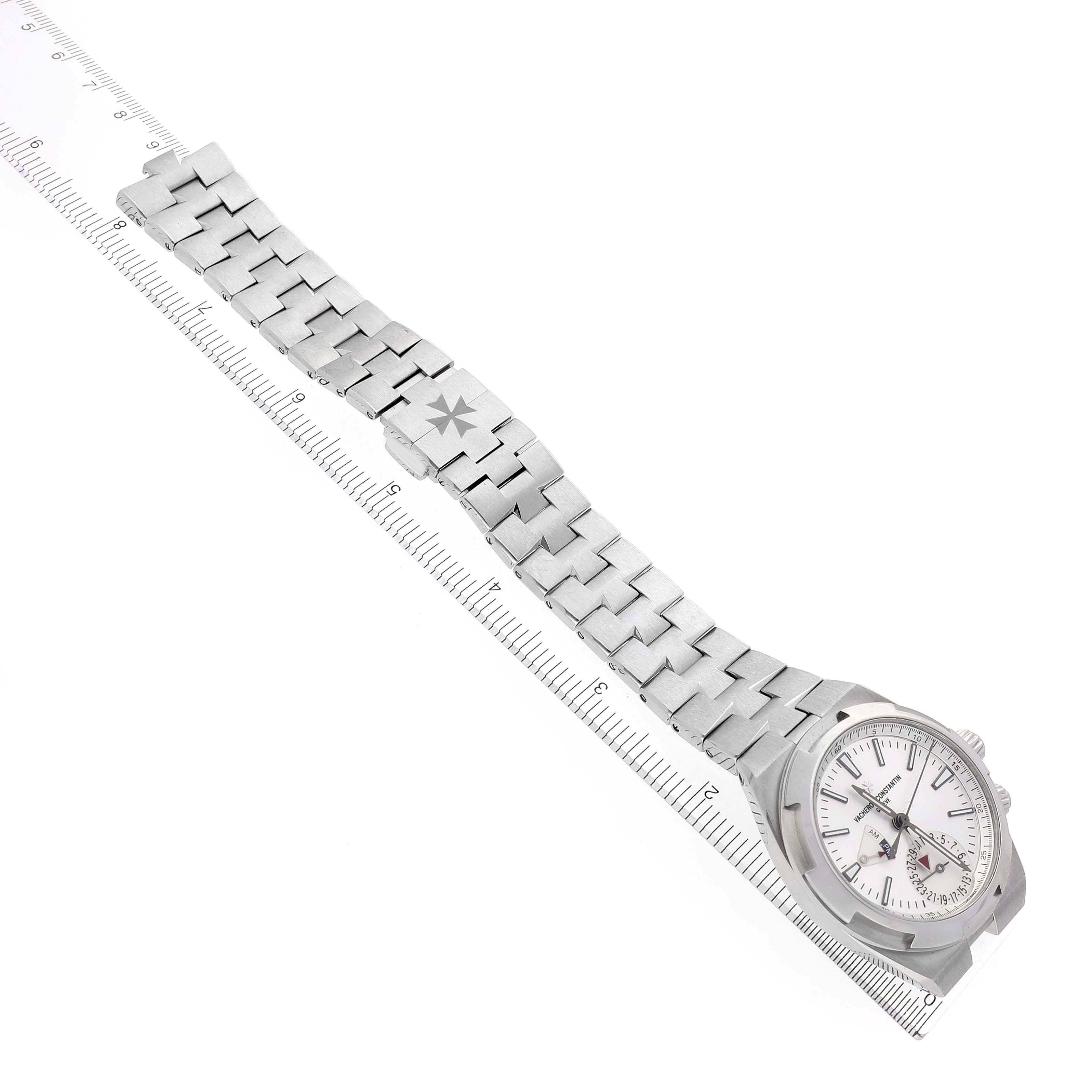 The image shows a Vacheron Constantin Overseas 7900V/110A-B333 Men's Stainless Steel Silver Dial 7900V/110A-B333 Men's Stainless Steel Silver Dial watch from a top-down angle, highlighting the bracelet, clasp, and watch face.