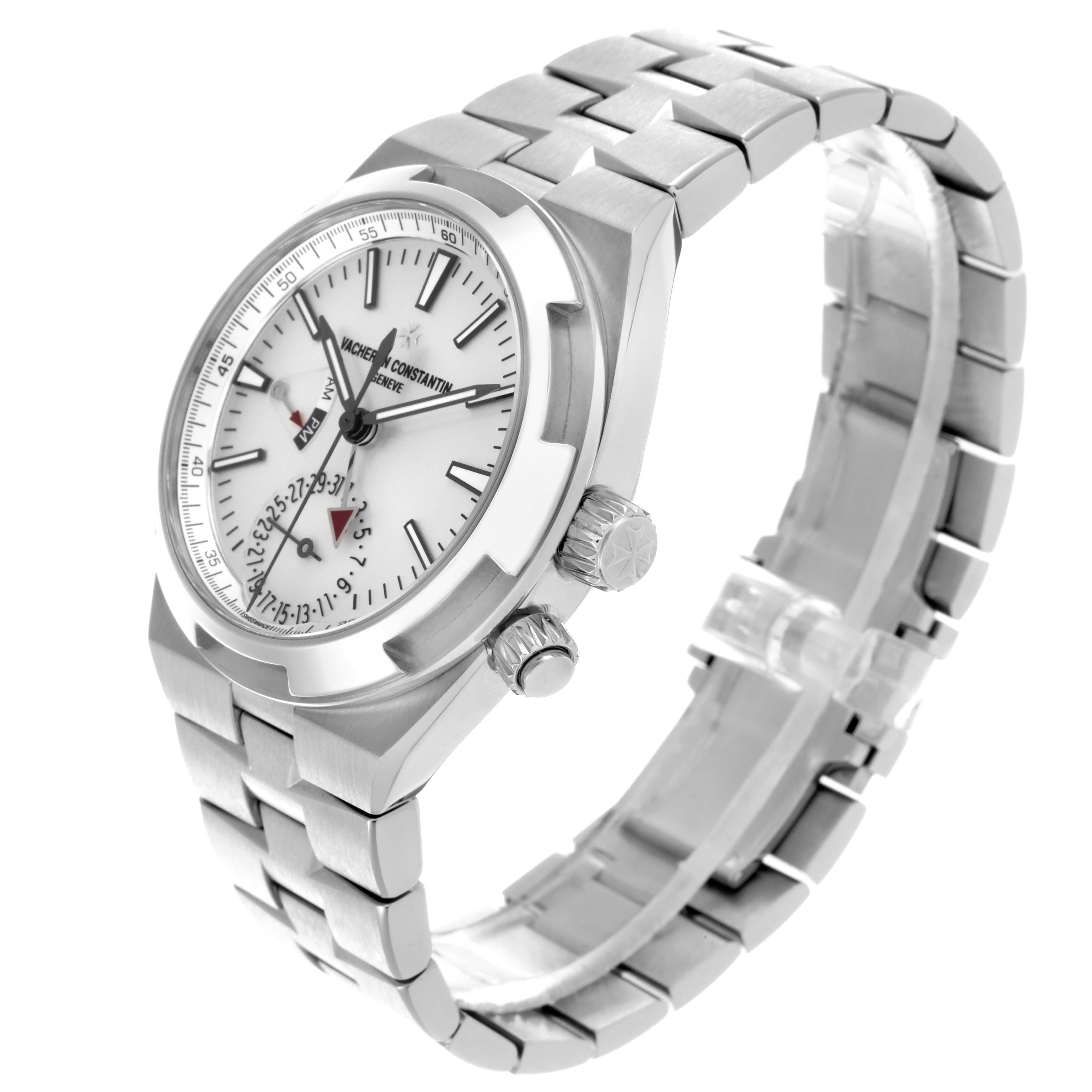 The Vacheron Constantin Overseas 7900V/110A-B333 Men's Stainless Steel Silver Dial 7900V/110A-B333 Men's Stainless Steel Silver Dial watch is shown at an angled side view, displaying its face, bezel, and metal bracelet.