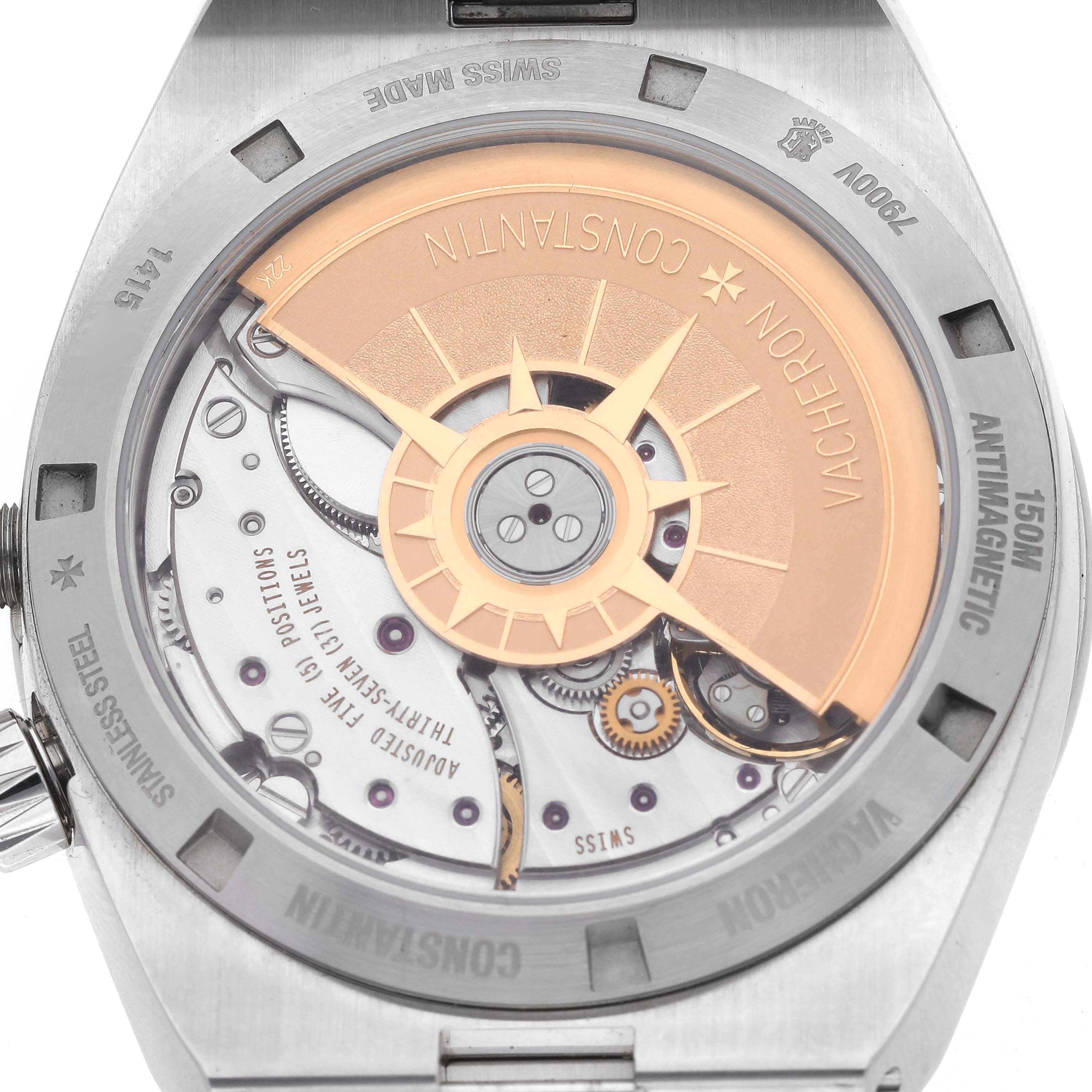 This image shows the back view of the Vacheron Constantin Overseas 7900V/110A-B333 Men's Stainless Steel Silver Dial 7900V/110A-B333 Men's Stainless Steel Silver Dial watch, highlighting its movement and rotor.