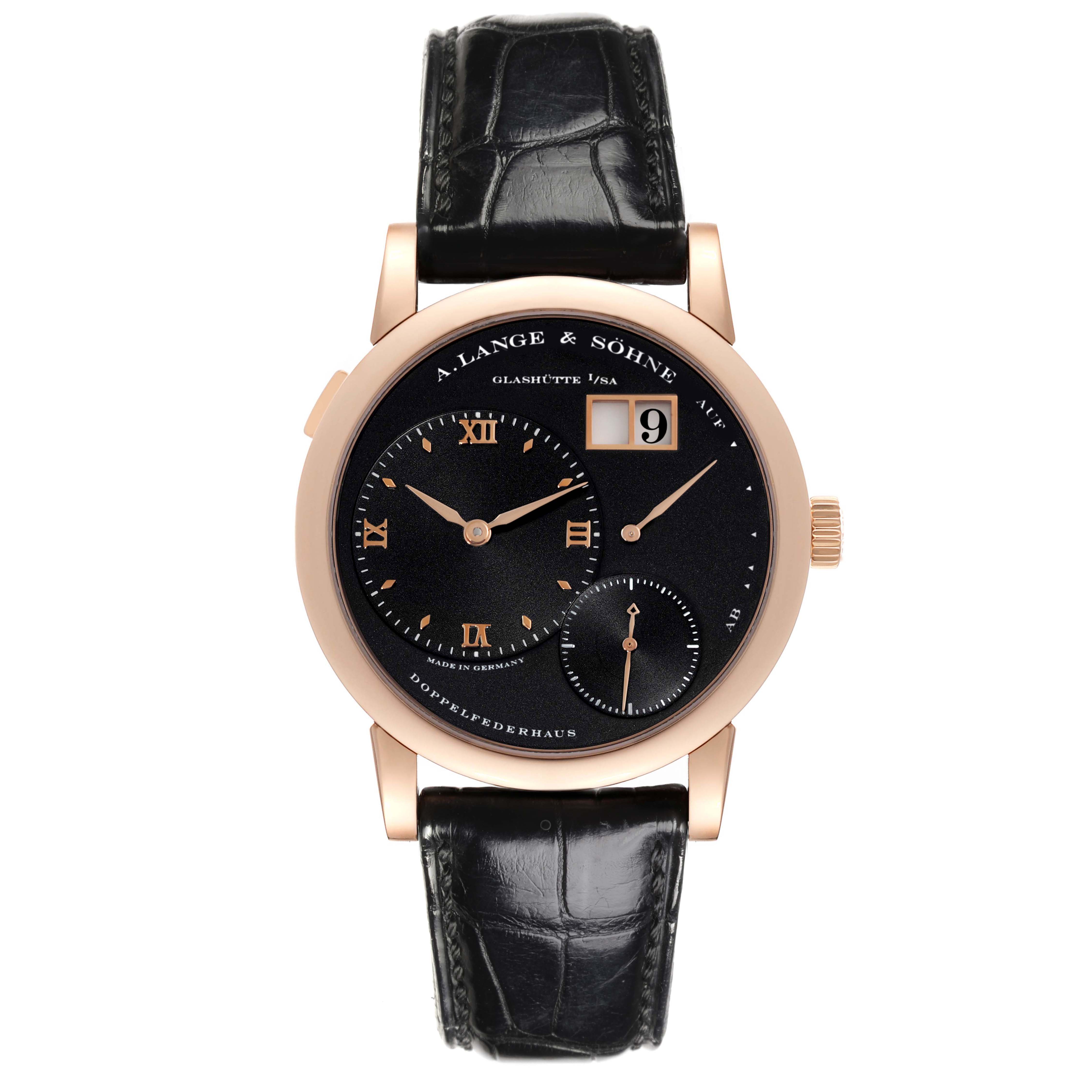 The A. Lange 
Sohne Lange 1 101.031 Men
s Rose Gold Black Dial watch is shown from the front, displaying the face, dial, hands, and leather strap.