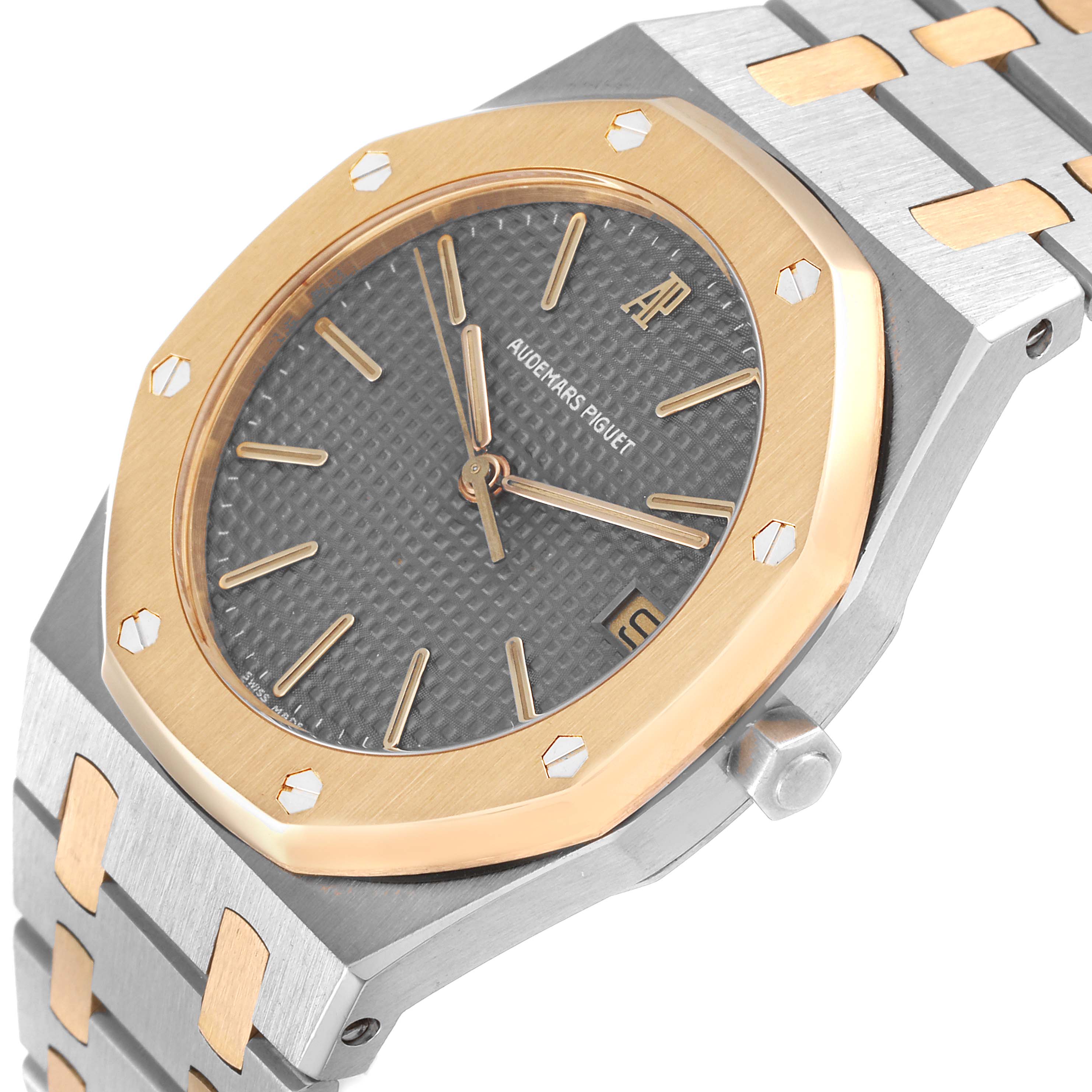 This image shows a close-up, angled view of the face, bezel, and part of the bracelet of an Audemars Piguet Royal Oak 56023SA Men's Steel and Gold (two tone) Grey Dial 56023SA Men's Steel and Gold (two tone) Grey Dial watch.