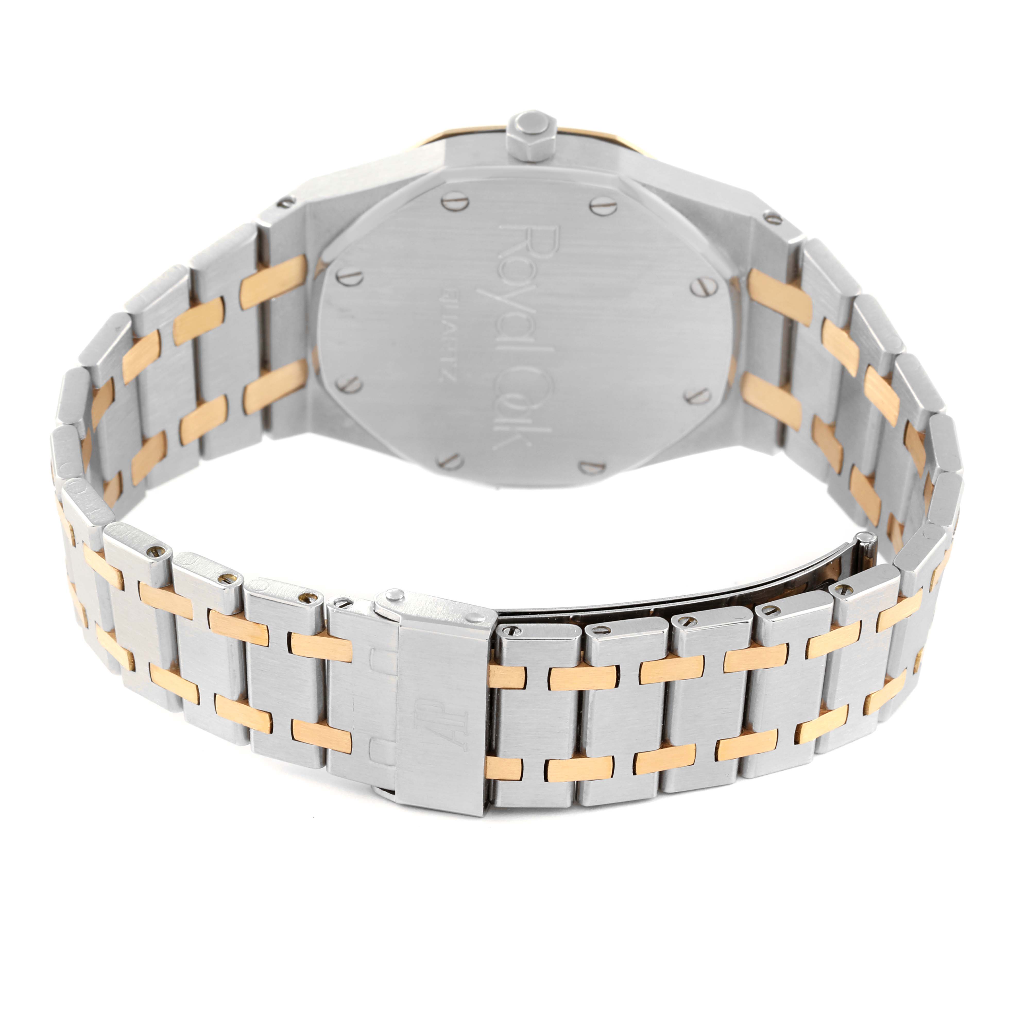 This image shows the back of the Royal Oak Audemars Piguet watch, highlighting the case back and two-tone bracelet.