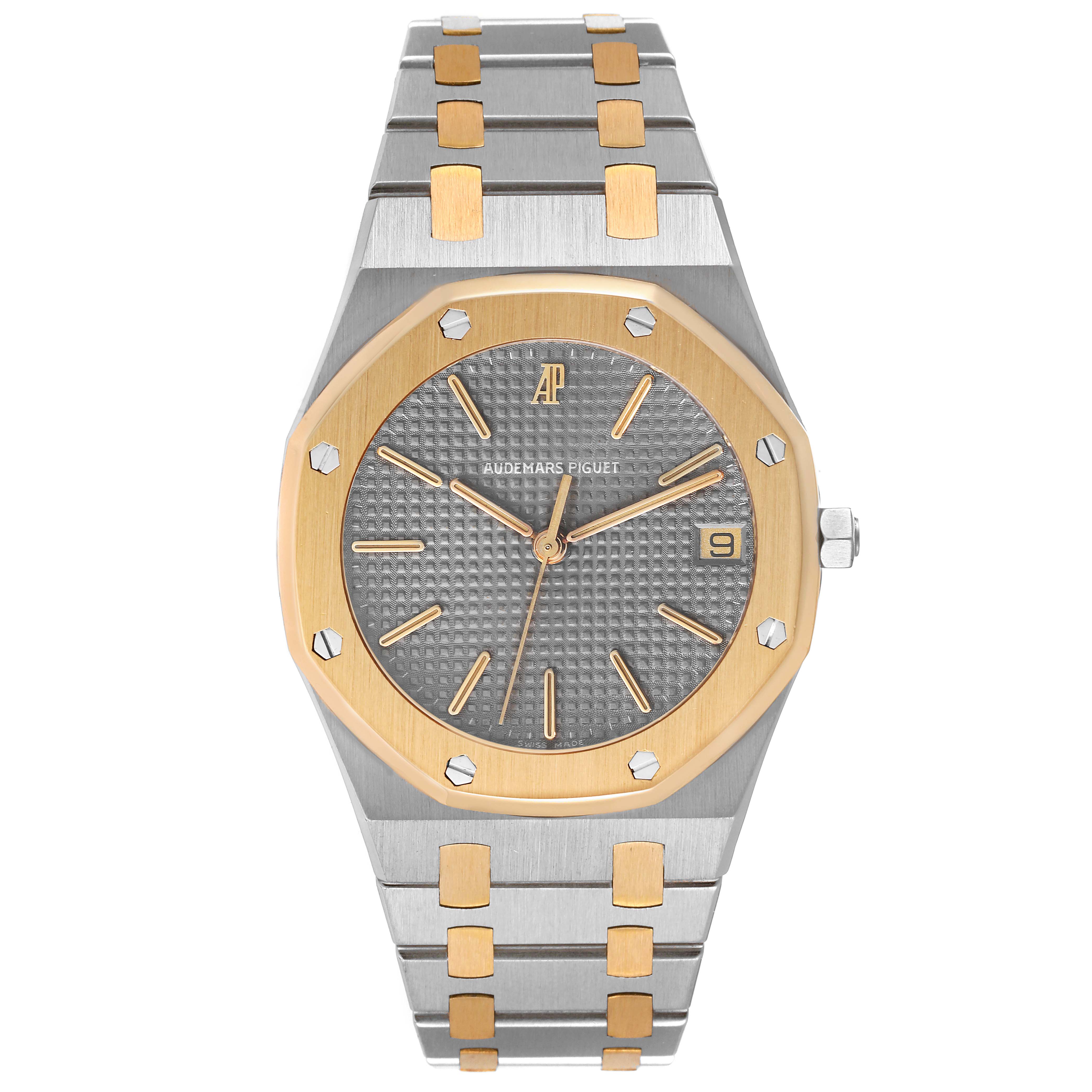 The image shows a front view of the Audemars Piguet Royal Oak 56023SA Men's Steel and Gold (two tone) Grey Dial 56023SA Men's Steel and Gold (two tone) Grey Dial watch, highlighting its dial, bezel, and bracelet.
