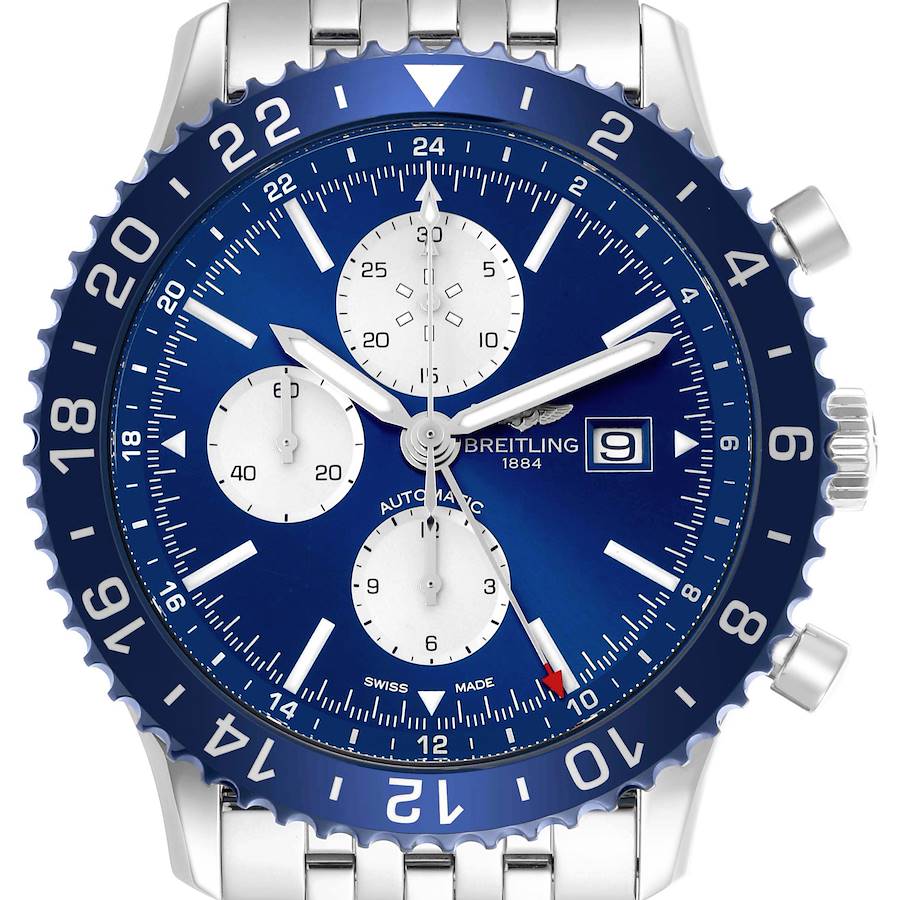 The Breitling Chronoliner watch is shown from a front angle, displaying its blue dial, bezel, subdials, and date window.