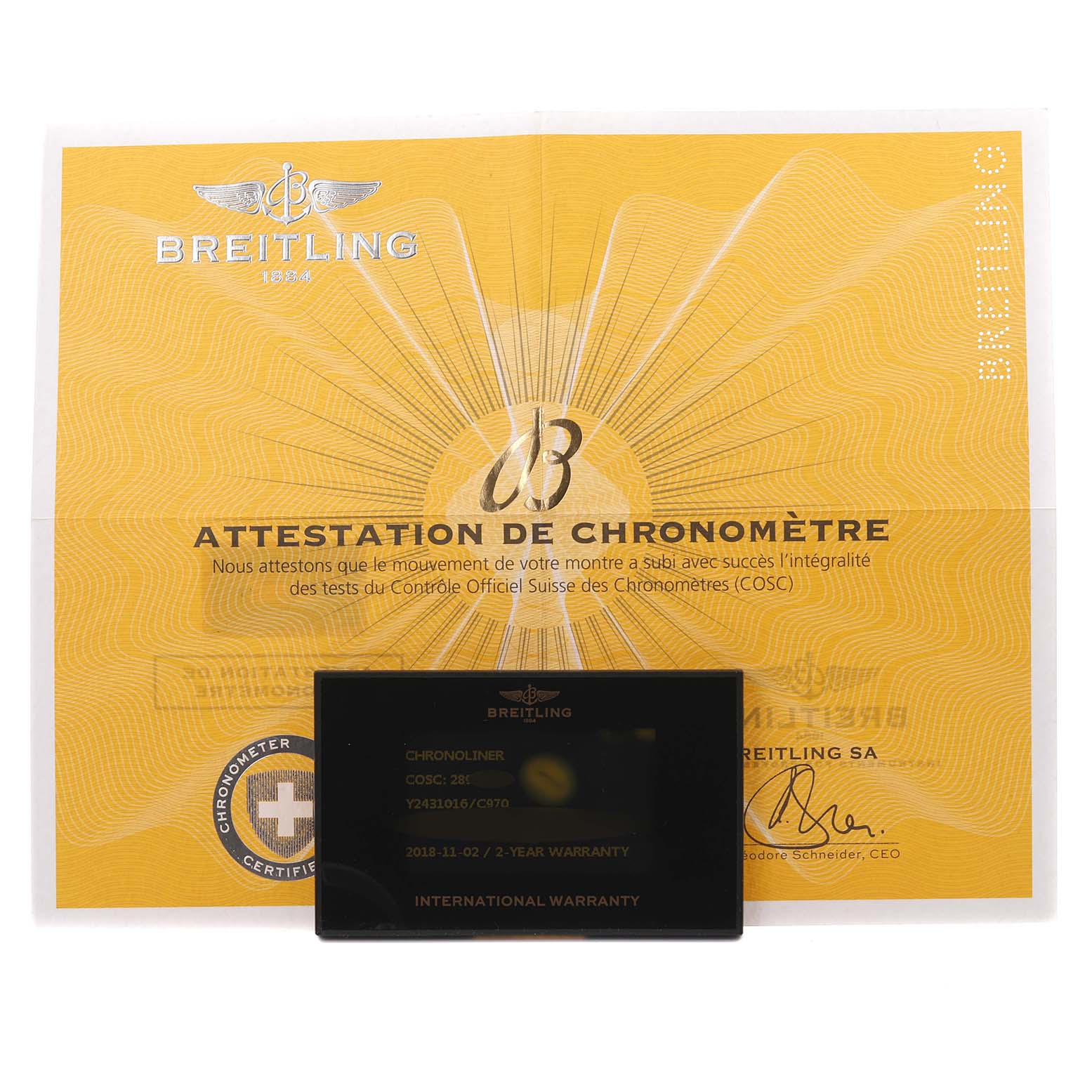 The image shows a Breitling Chronoliner Y24310 Men's Stainless Steel Blue Dial Y24310 Men's Stainless Steel Blue Dial warranty card and chronometer certificate.