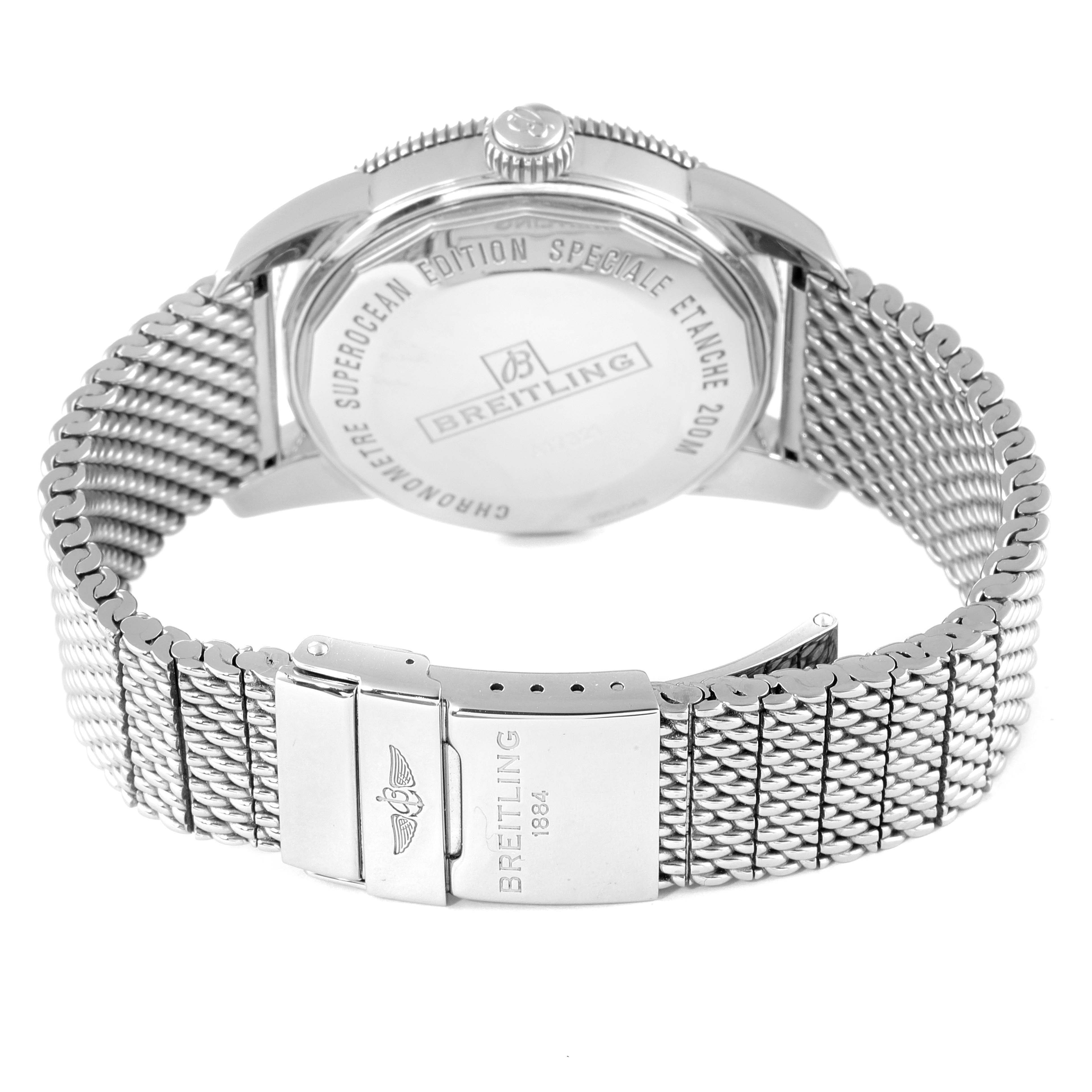 The image shows the back view and bracelet of the Breitling Superocean A17321 Men's Stainless Steel Black Dial A17321 Men's Stainless Steel Black Dial watch, highlighting the case back engraving and metal mesh band.