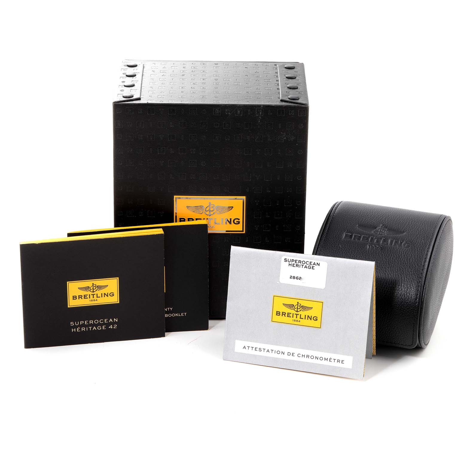 The image shows the packaging, manuals, and warranty booklet for the Breitling Superocean A17321 Men's Stainless Steel Black Dial A17321 Men's Stainless Steel Black Dial model.