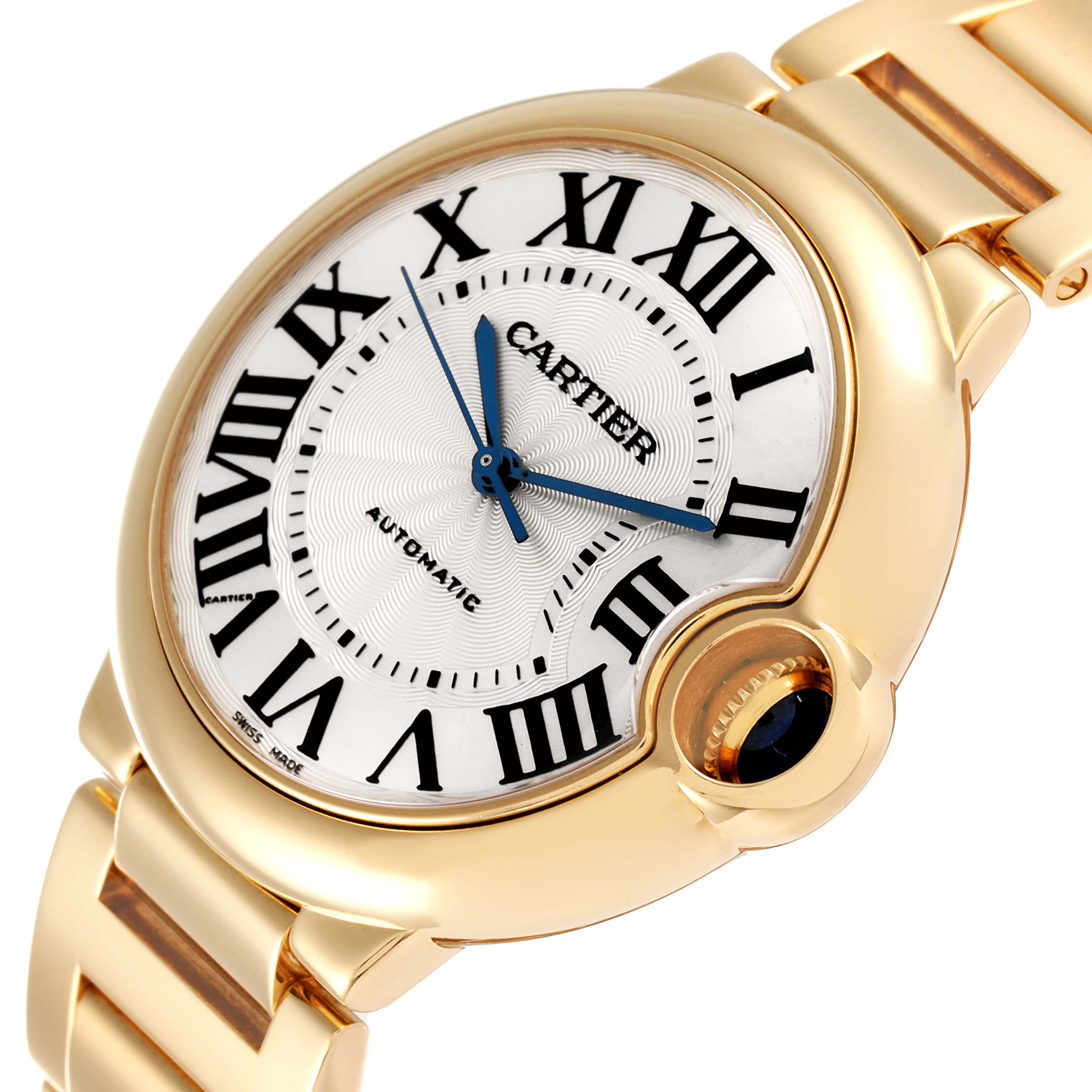 This image shows a close-up, angled view of the Cartier Ballon Bleu W69003Z2 Men's Yellow Gold Silver Dial W69003Z2 Men's Yellow Gold Silver Dial watch, highlighting the face, crown, and part of the metal bracelet.