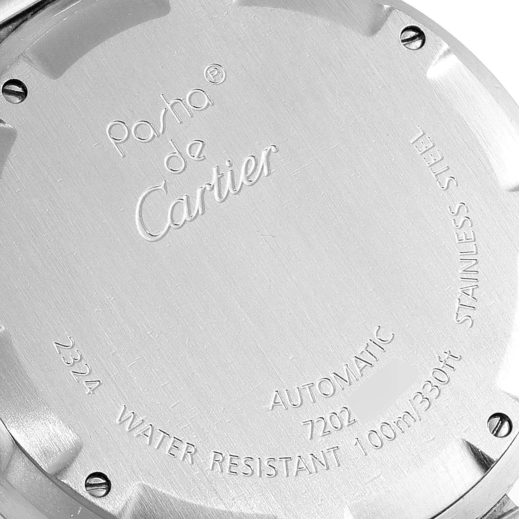 The image shows the stainless steel back case of a Cartier Pasha W31074M7 Women's Stainless Steel White Dial W31074M7 Women's Stainless Steel White Dial watch, displaying engravings and specifications.