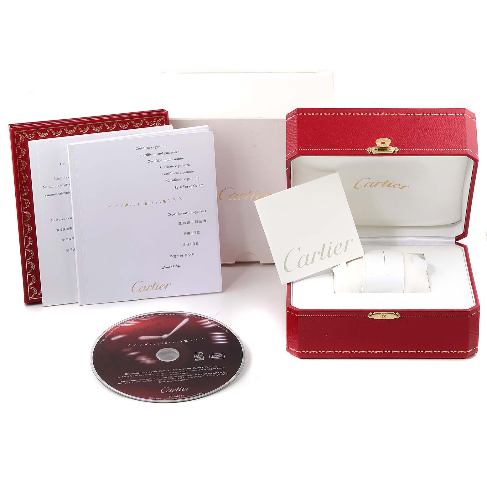 This image shows the packaging and accessories of a Cartier Pasha W31074M7 Men's Stainless Steel White Dial W31074M7 Men's Stainless Steel White Dial watch, including the box, manuals, and a CD.