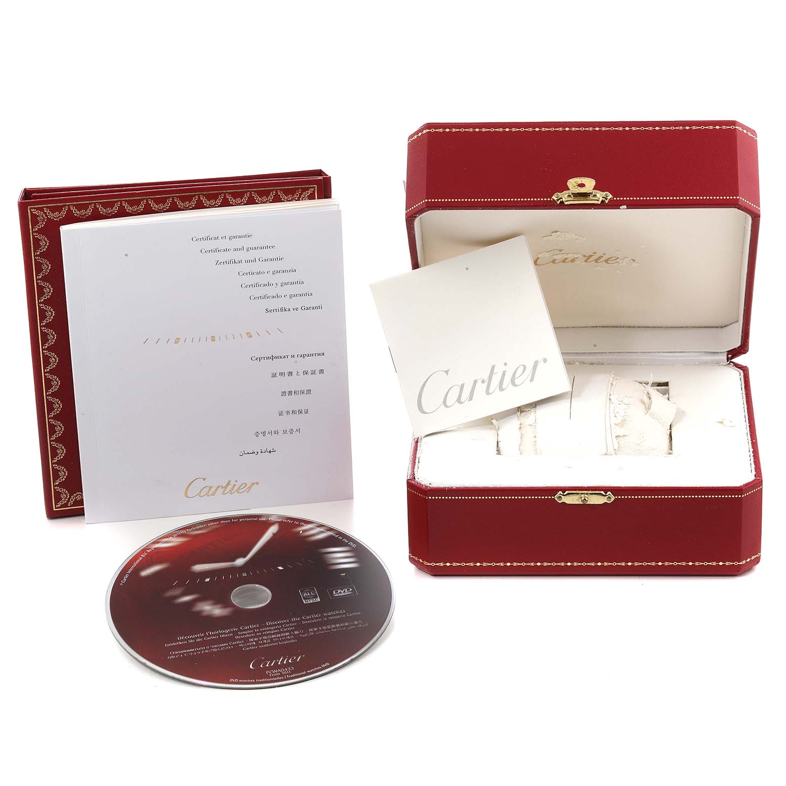 The image shows the packaging and accessories for a Cartier Ronde W6701005 Men
s Stainless Steel Silver Dial W6701005 Men
s Stainless Steel Silver Dial model watch, including a red box, certificates, and a DVD.