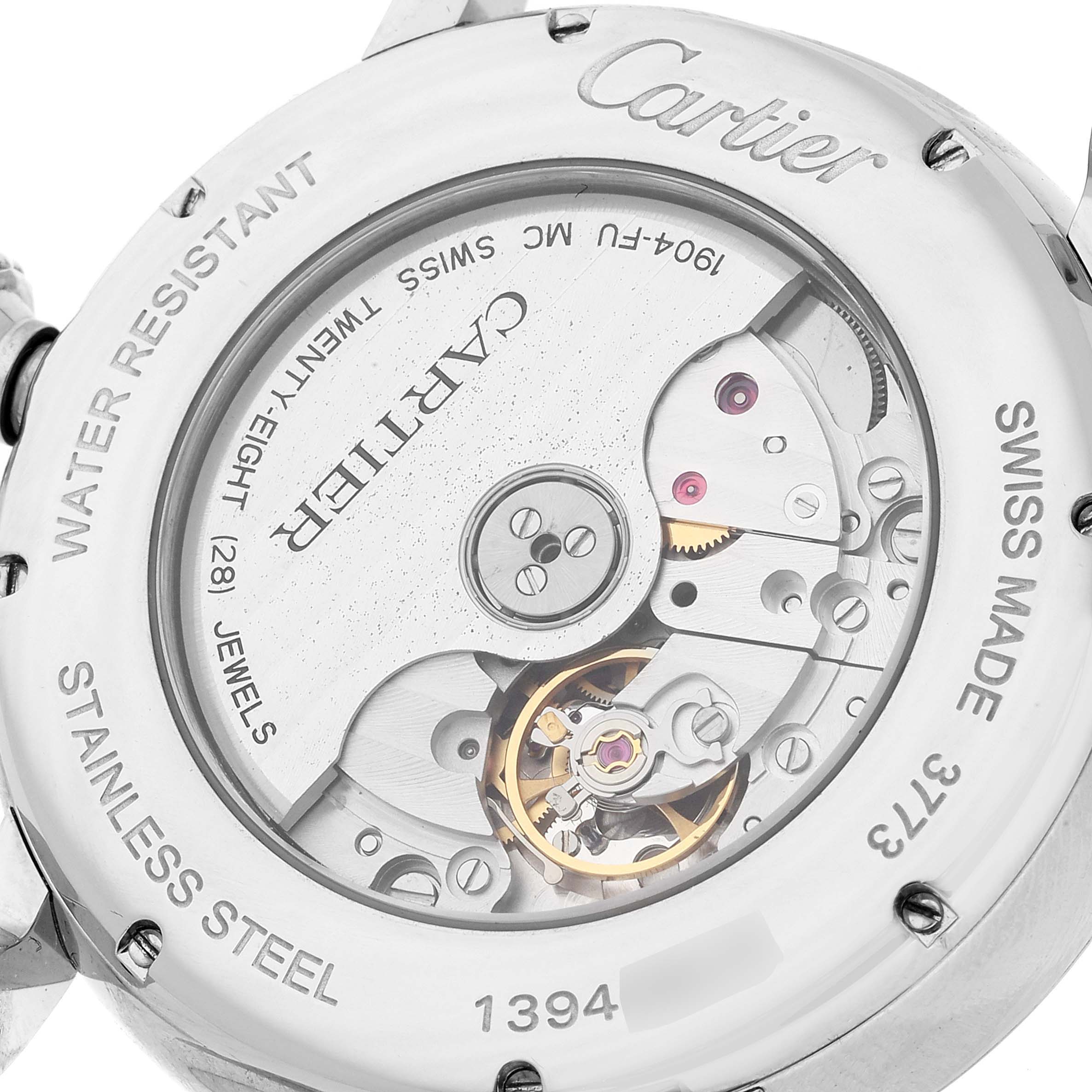 This image shows the back of the Rotonde de Cartier watch by Cartier, featuring the mechanical movement and inscriptions.