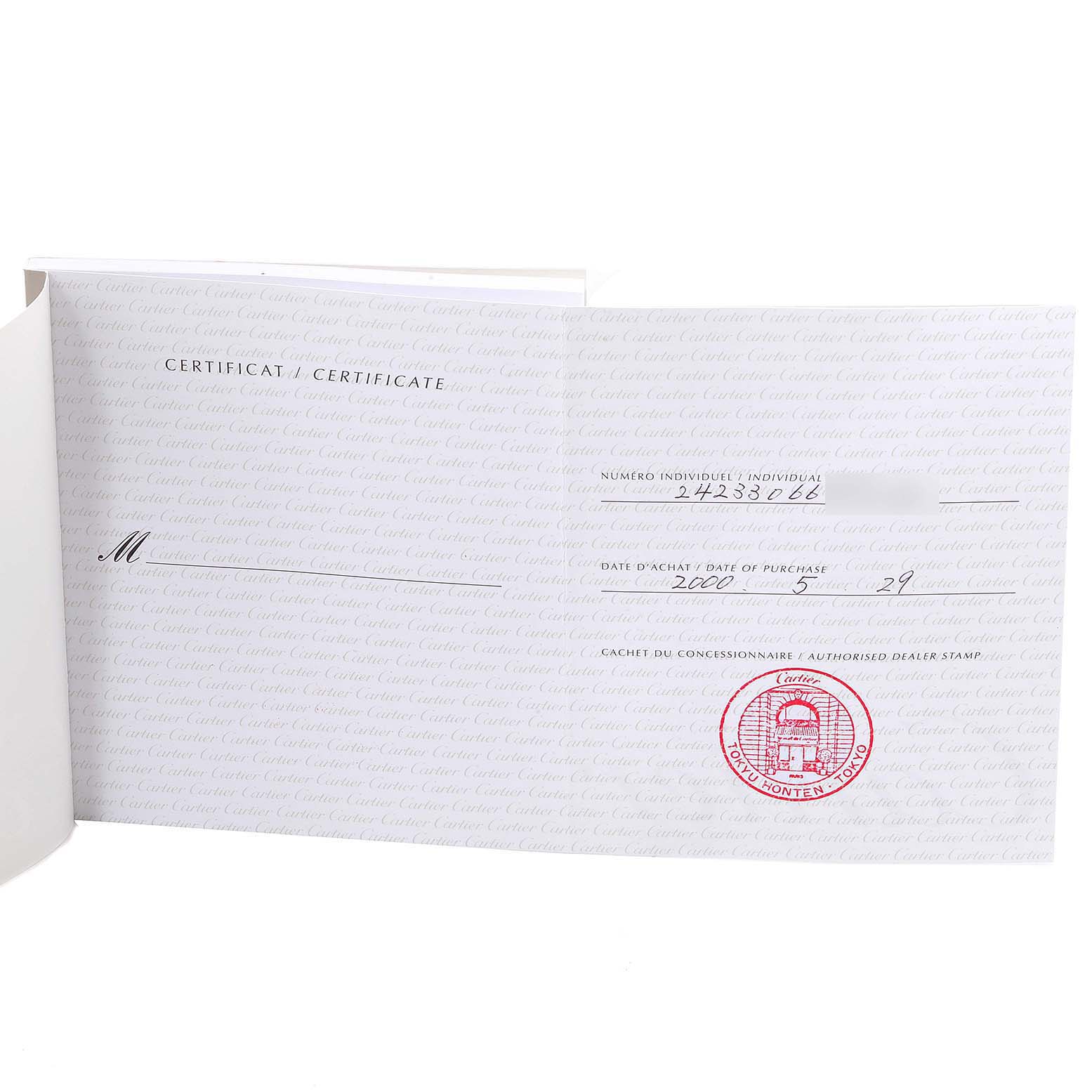 The image shows the certificate of authenticity and purchase details for a Santos model by Cartier.