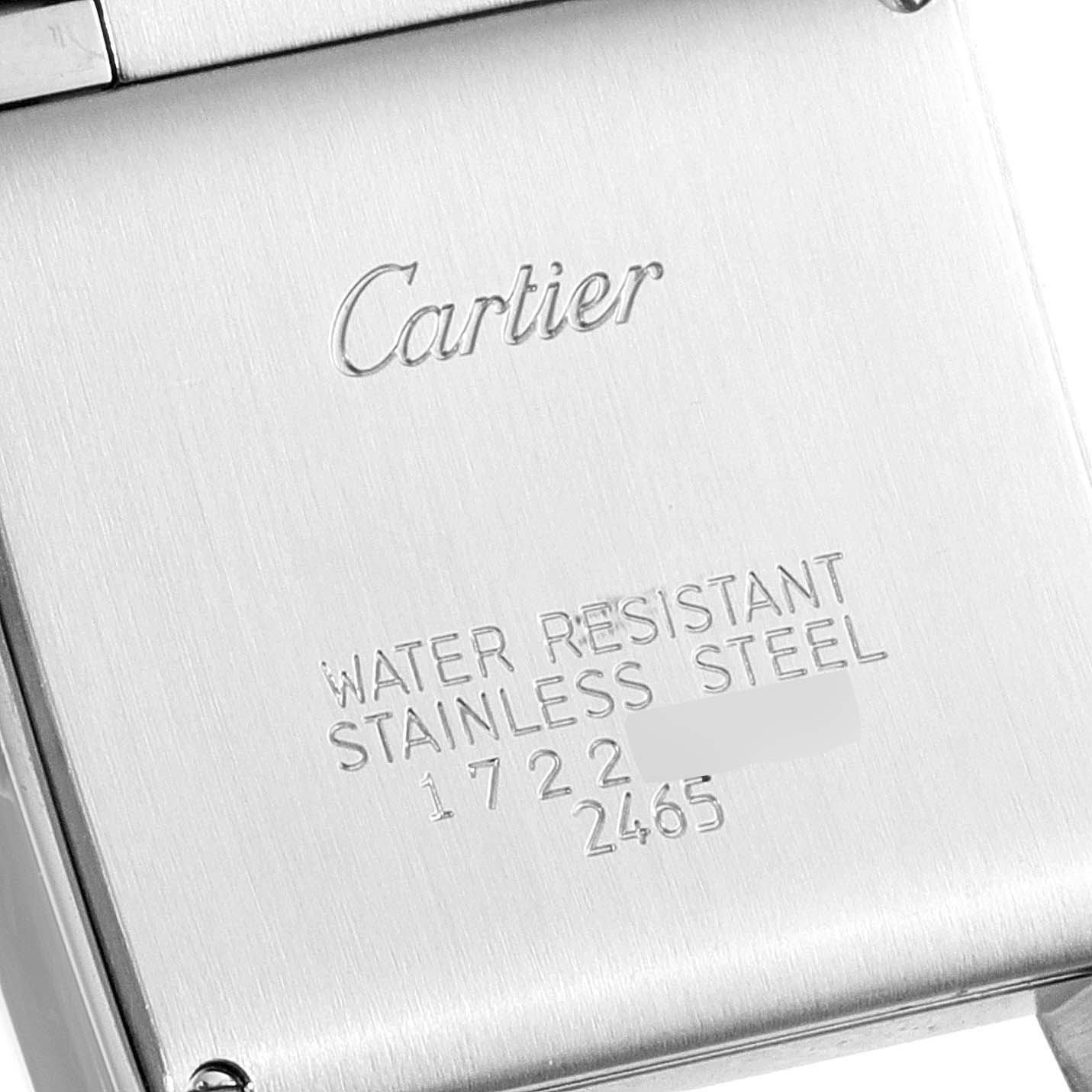 This is the back case of a Cartier Tank Francaise W51011Q3 Women
s Stainless Steel Silver Dial W51011Q3 Women
s Stainless Steel Silver Dial watch, showing its stainless steel material and water resistance.
