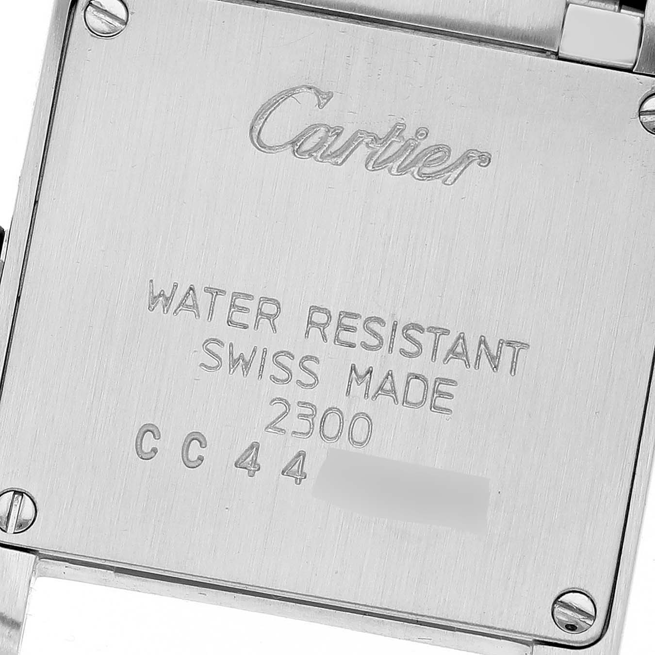 This image shows the back case of the Cartier Tank Française watch with water resistance and Swiss made markings.