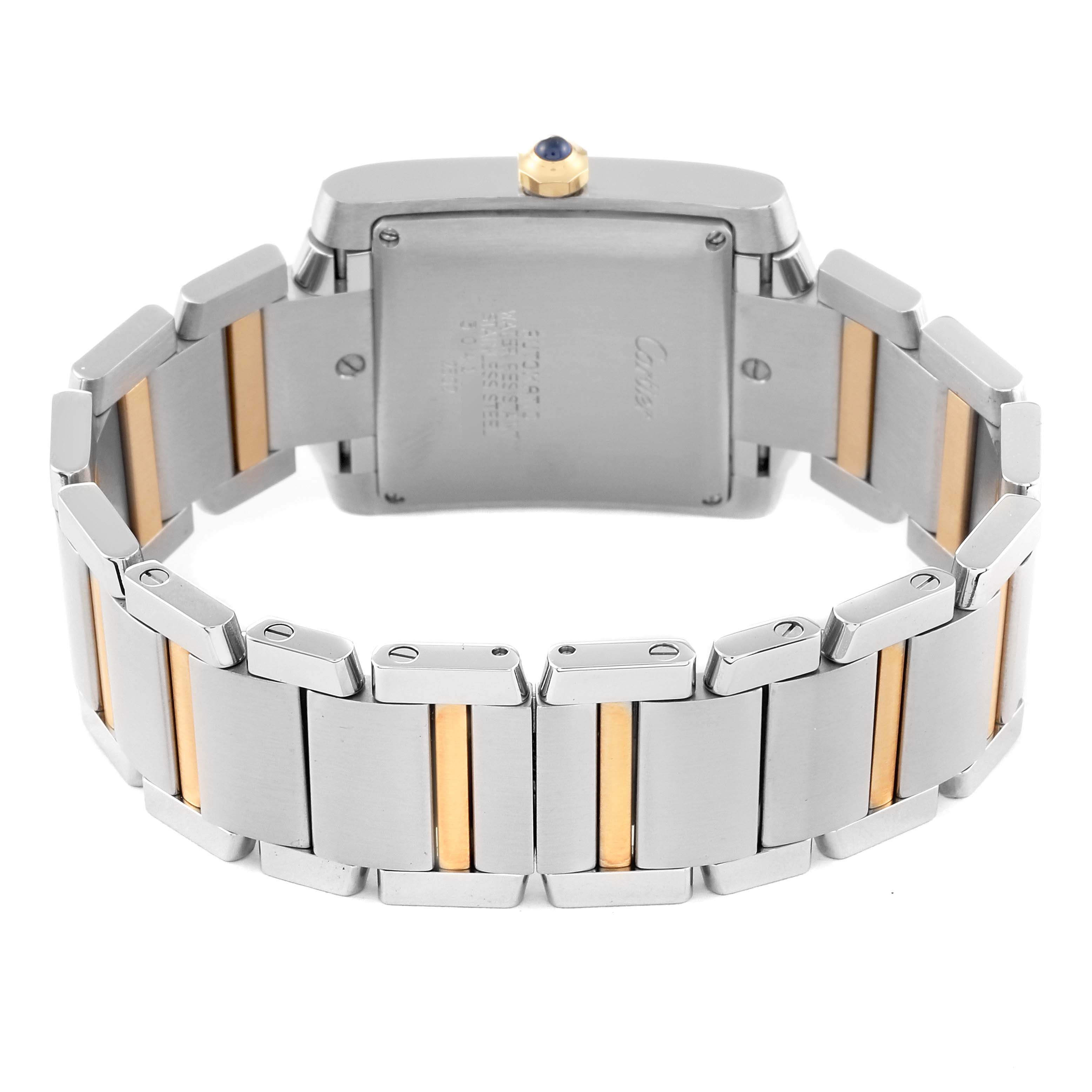 The image shows the back case and bracelet of the Cartier Tank Française watch, highlighting its two-tone design.
