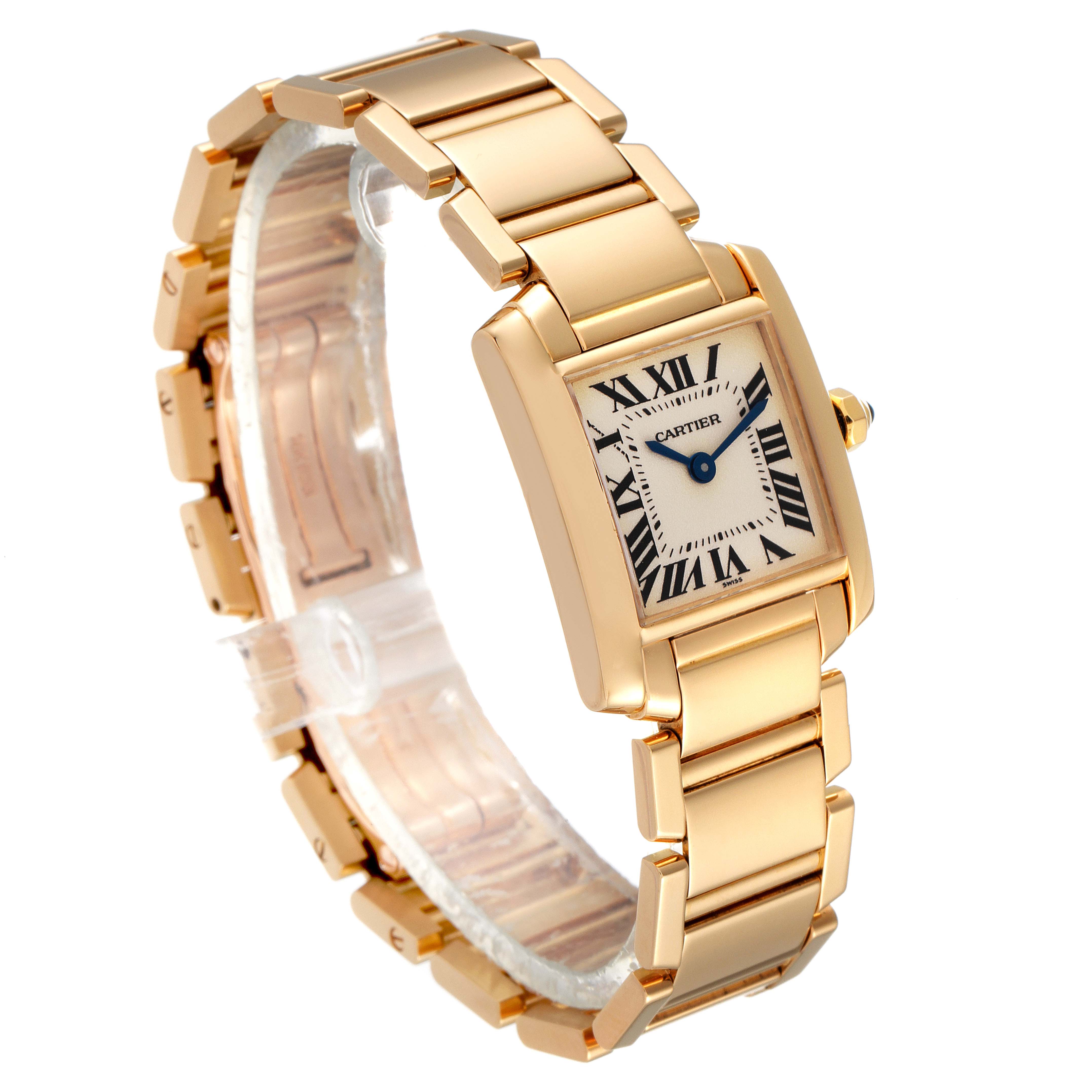 The image shows the Cartier Tank Francaise W50002N2 Women's Yellow Gold Silver Dial W50002N2 Women's Yellow Gold Silver Dial watch from a front-angle view, highlighting its gold bracelet and rectangular face.