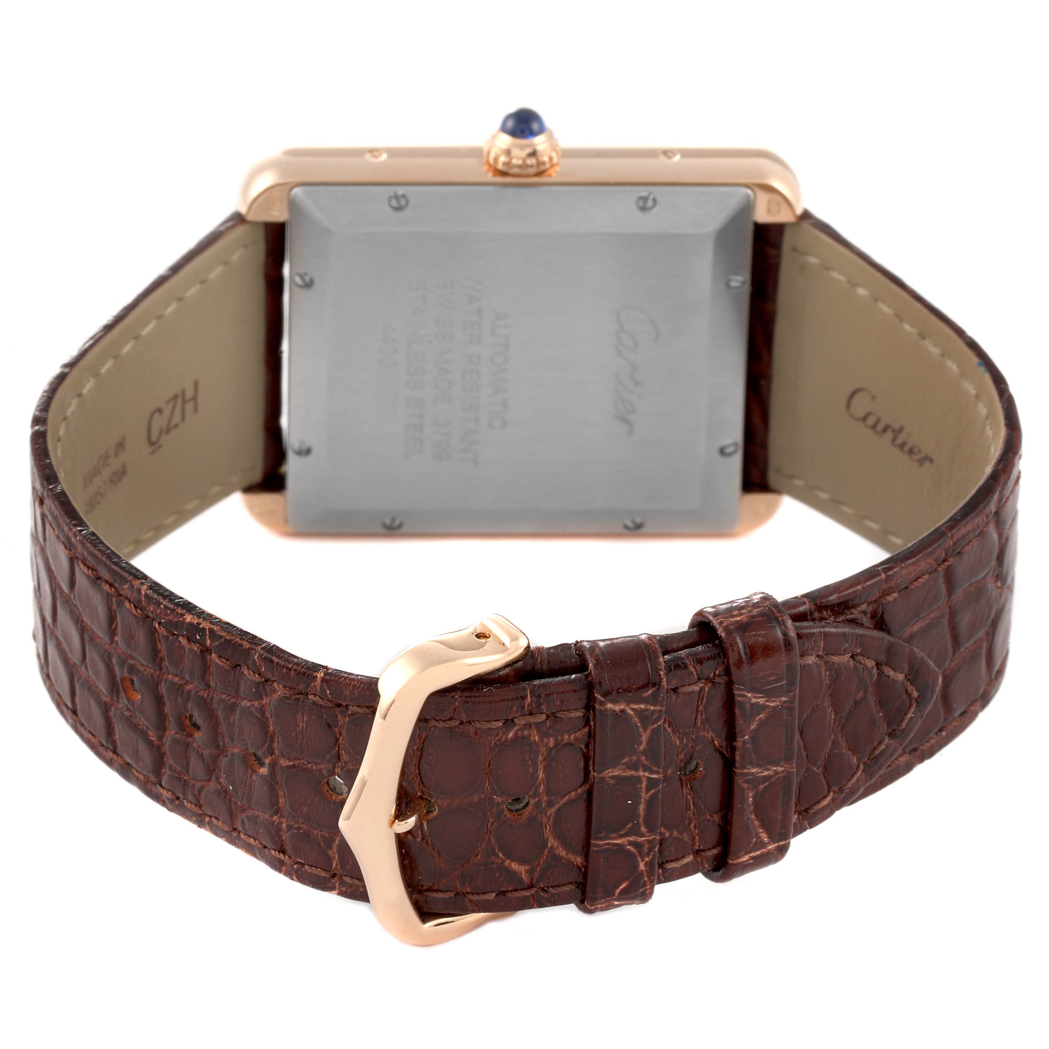 This image shows the back side of a Cartier Tank Solo W5200026 Men's Rose Gold Silver Dial W5200026 Men's Rose Gold Silver Dial watch, highlighting its case, leather strap, and buckle.