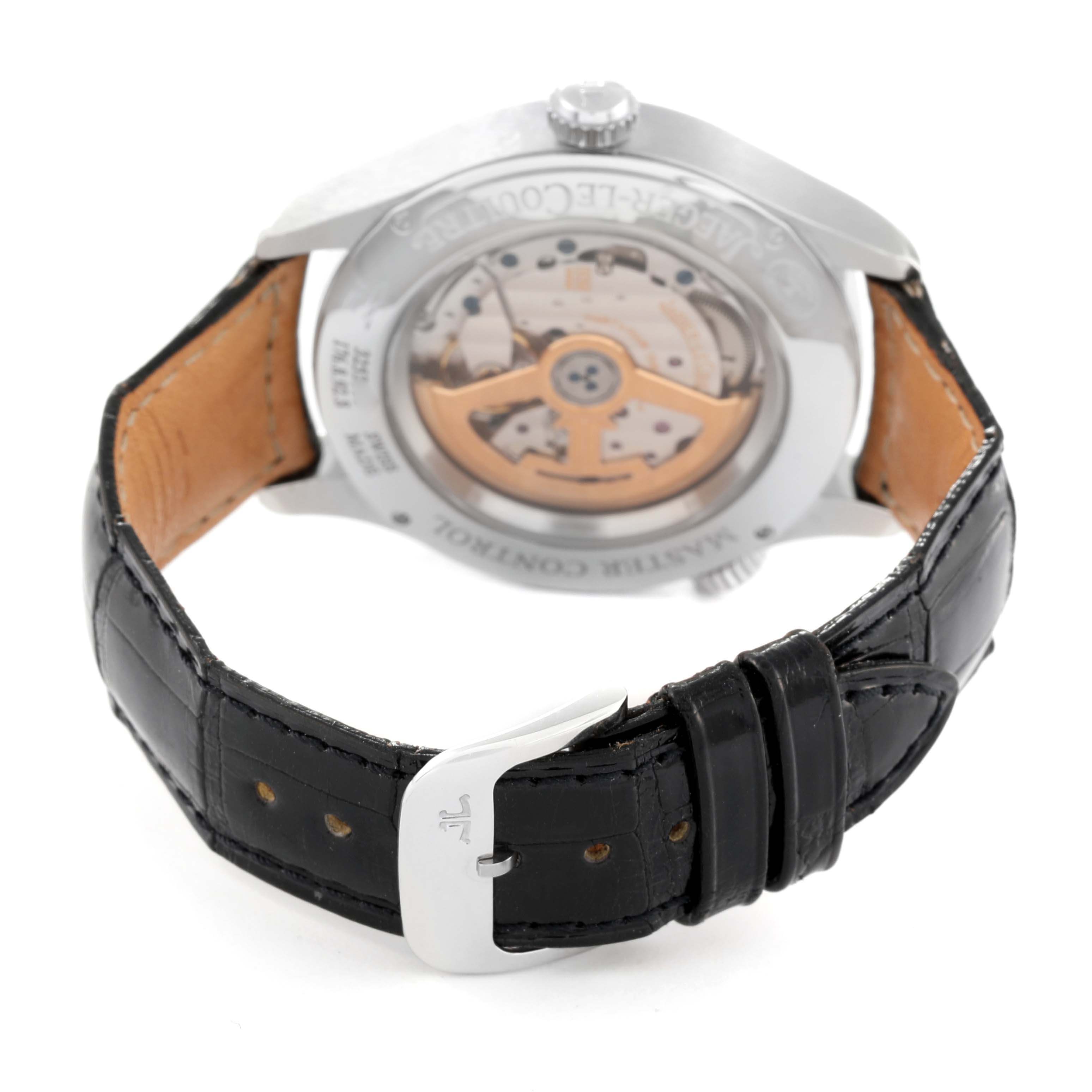 The image shows the back view of a Jaeger LeCoultre Master Q1428530 Men's Stainless Steel Silver Dial Q1428530 Men's Stainless Steel Silver Dial model watch, highlighting the movement and black leather strap with buckle.
