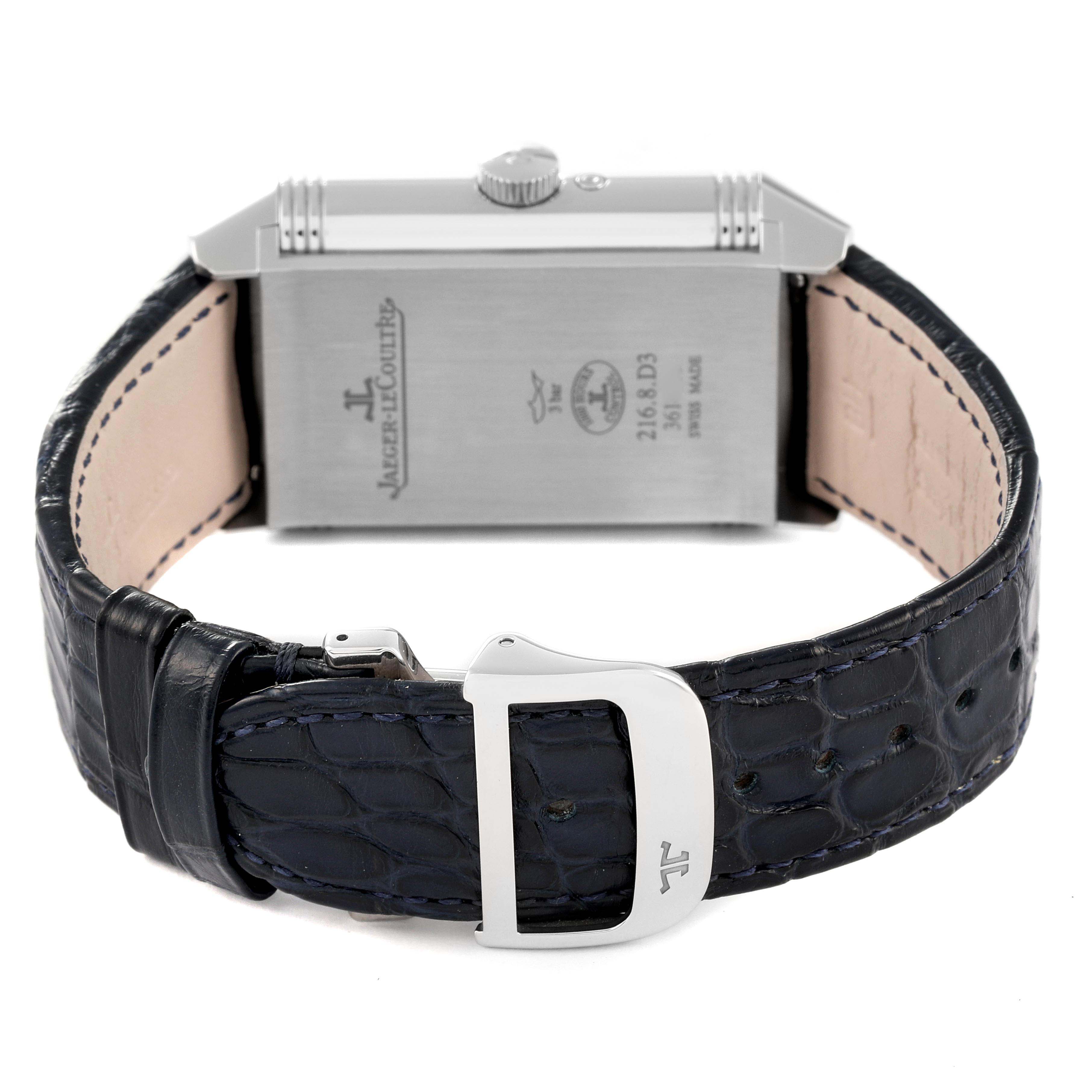 This image shows the back of the Jaeger LeCoultre Reverso Q3958420 Men's Stainless Steel Silver Dial Q3958420 Men's Stainless Steel Silver Dial watch, a portion of the leather strap, and the clasp.