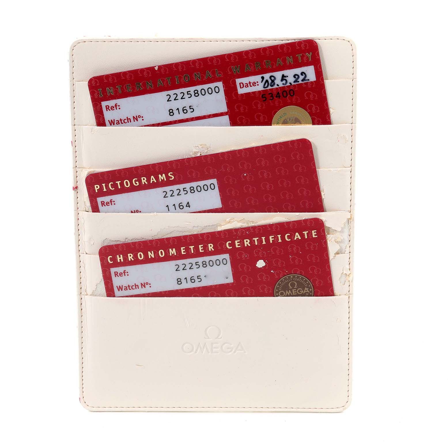 The image shows the International Warranty, Pictograms, and Chronometer Certificate cards for an Omega Seamaster 2225.80.00 Men's Stainless Steel Blue Dial 2225.80.00 Men's Stainless Steel Blue Dial model.