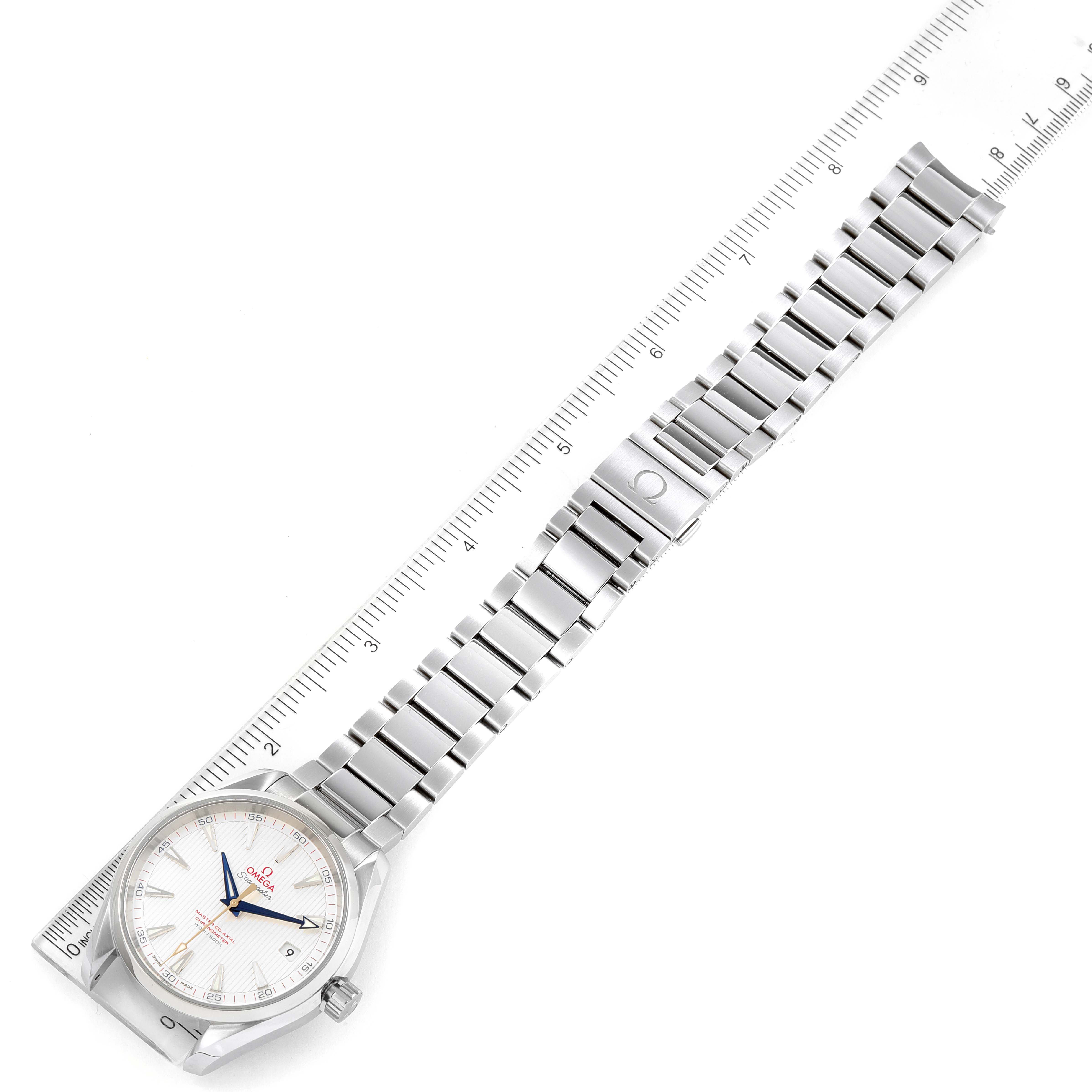 The image shows an Omega Aqua Terra 231.10.42.21.02.004 Men's Stainless Steel Silver Dial 231.10.42.21.02.004 Men's Stainless Steel Silver Dial watch laid flat with its face and metal bracelet aligned next to a ruler for scale.
