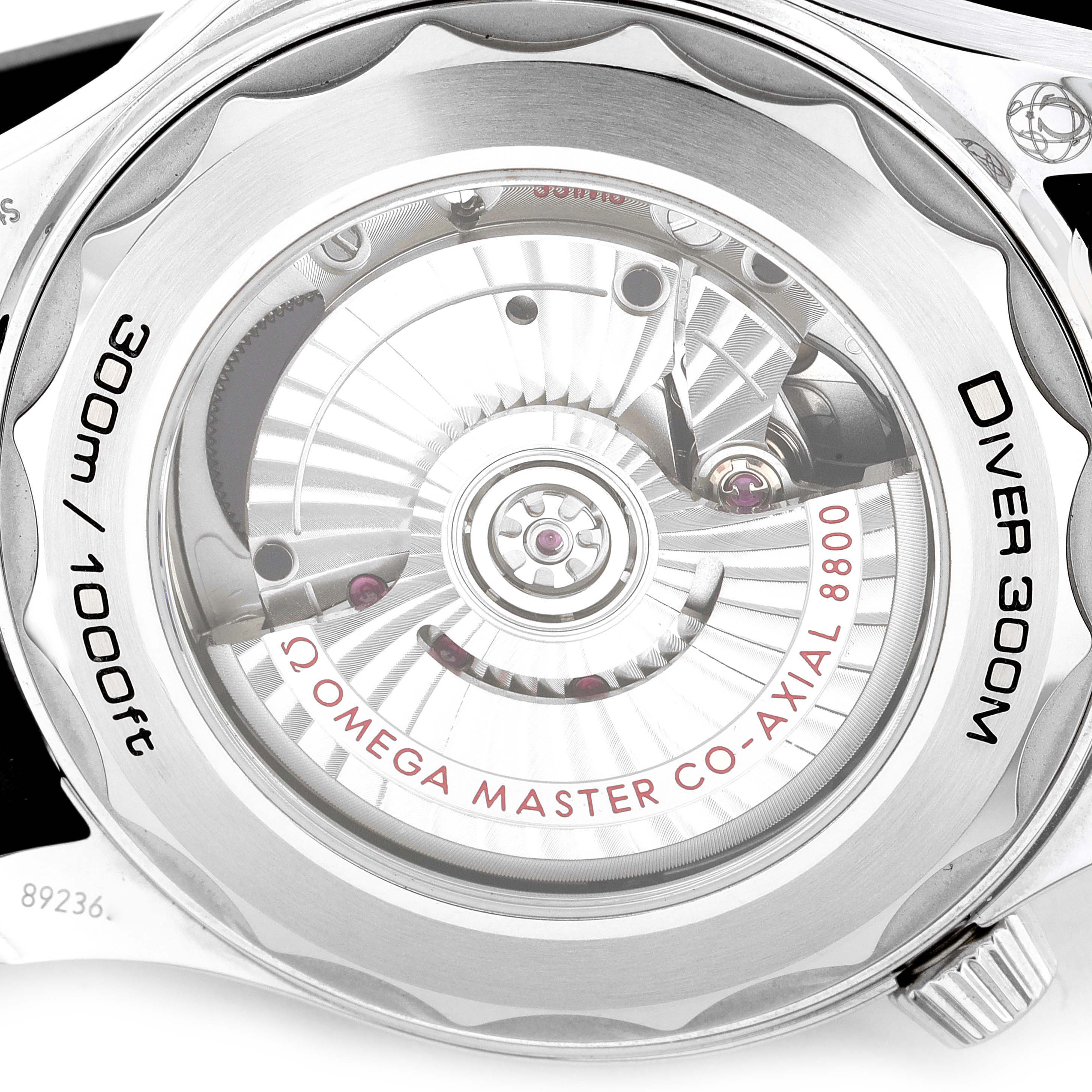 The image shows the back view of an Omega Seamaster 210.32.42.20.04.001 Men's Stainless Steel White Dial 210.32.42.20.04.001 Men's Stainless Steel White Dial Diver 300M watch, featuring the intricate mechanics and Co-Axial movement.