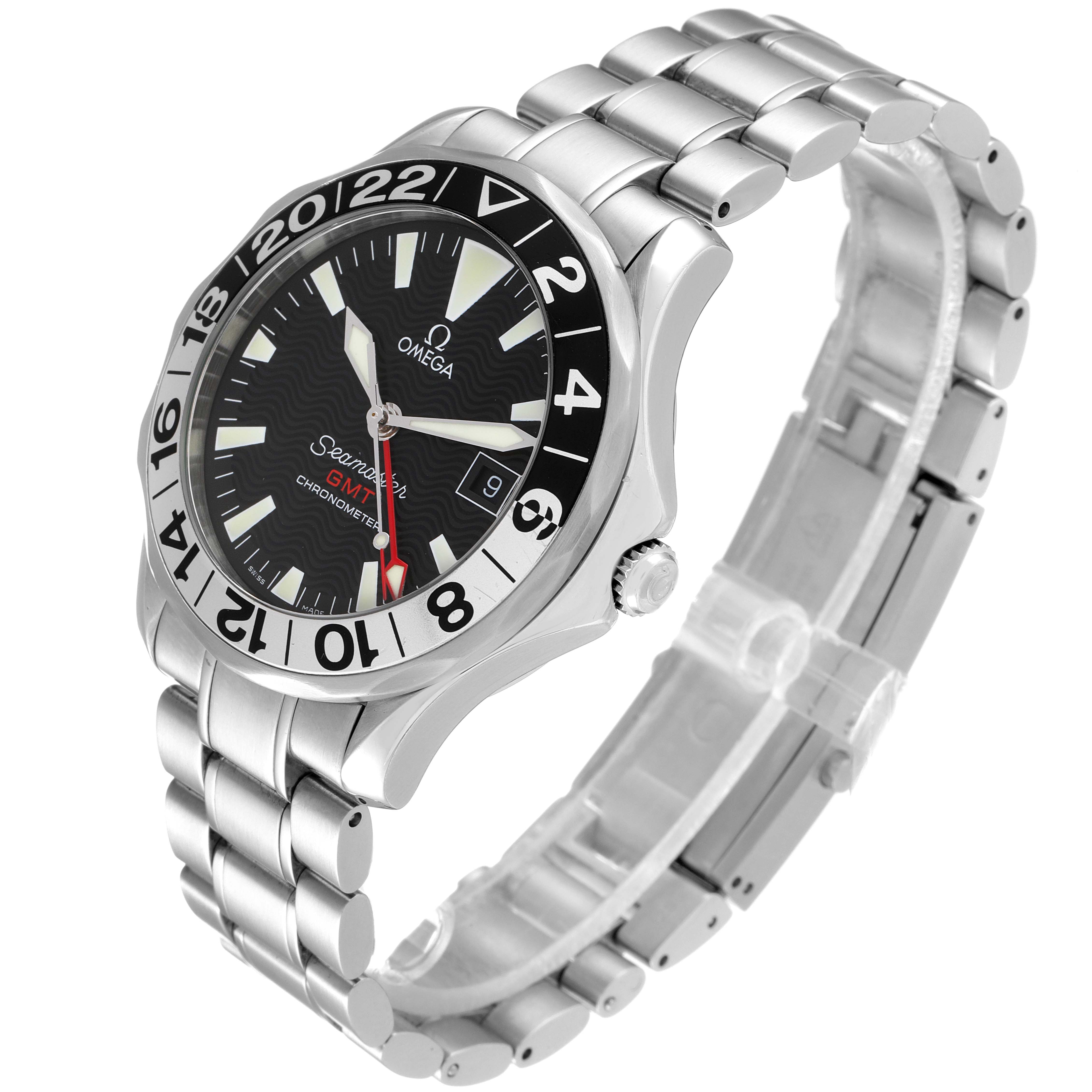 This image shows an Omega Seamaster 2234.50.00 Men's Stainless Steel Black Dial 2234.50.00 Men's Stainless Steel Black Dial watch angled to display its face, bezel with GMT markings, and stainless steel bracelet.