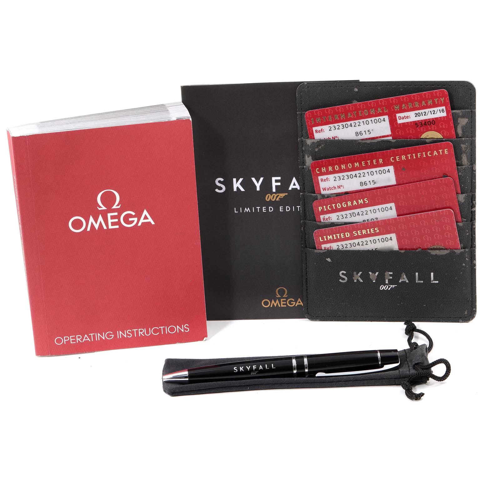 The image shows the accessories for the Omega Planet Ocean 232.30.42.21.01.004 Men's Stainless Steel Black Dial 232.30.42.21.01.004 Men's Stainless Steel Black Dial Skyfall Limited Edition watch, including manuals, certification cards, and a branded pen.