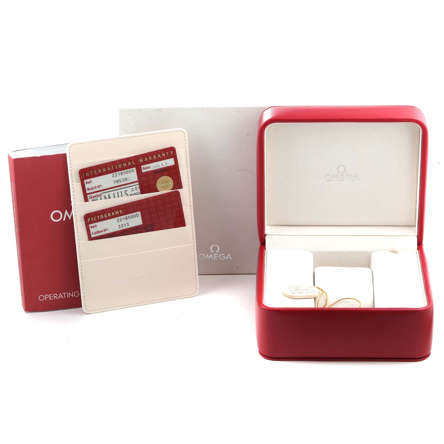 The image shows an Omega Planet Ocean 2218.50.00 Men's Stainless Steel Black Dial 2218.50.00 Men's Stainless Steel Black Dial watch box, warranty cards, and an operating manual.