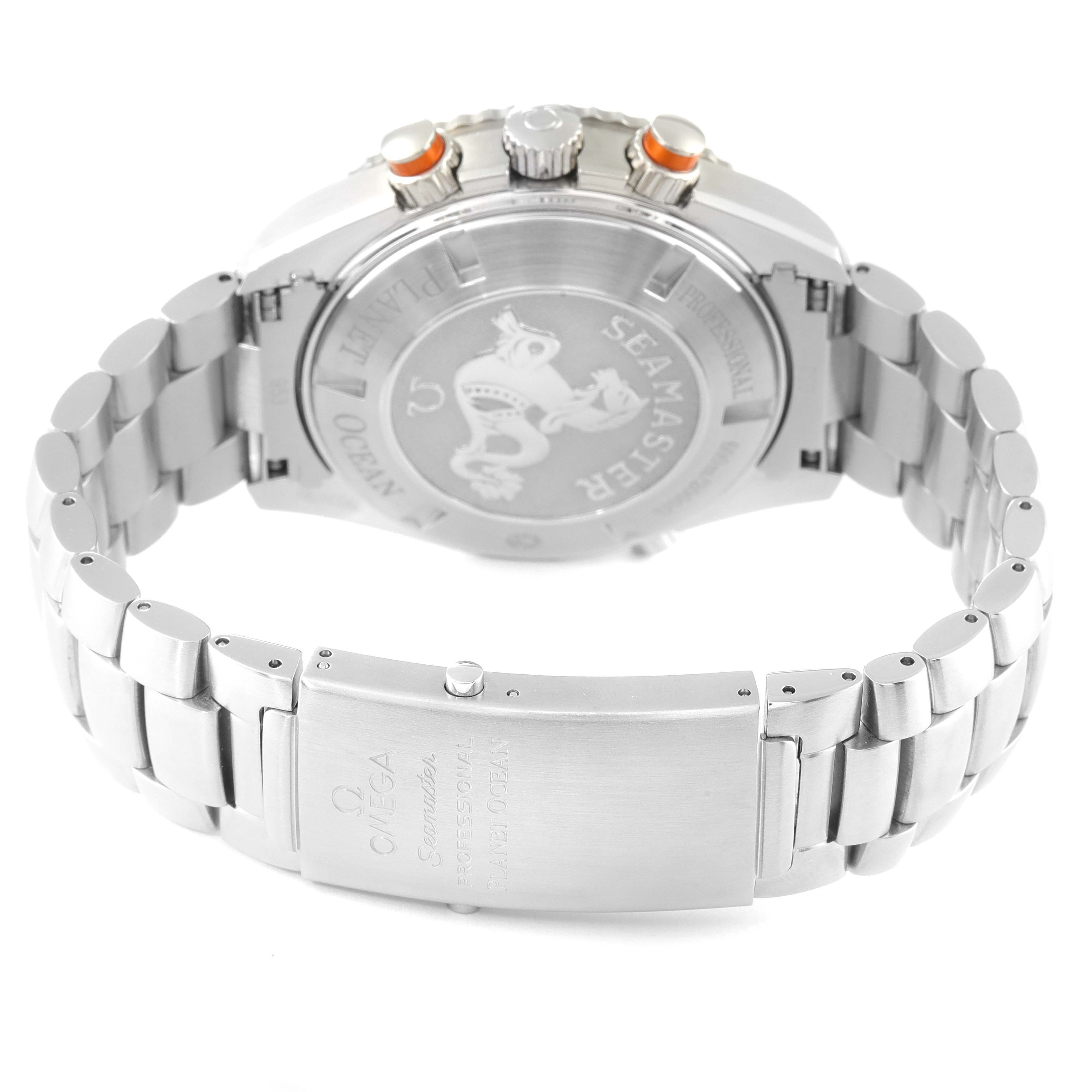 The image shows the back and bracelet clasp of the Omega Planet Ocean 2218.50.00 Men's Stainless Steel Black Dial 2218.50.00 Men's Stainless Steel Black Dial watch, highlighting the Seamaster engraving on the case back.