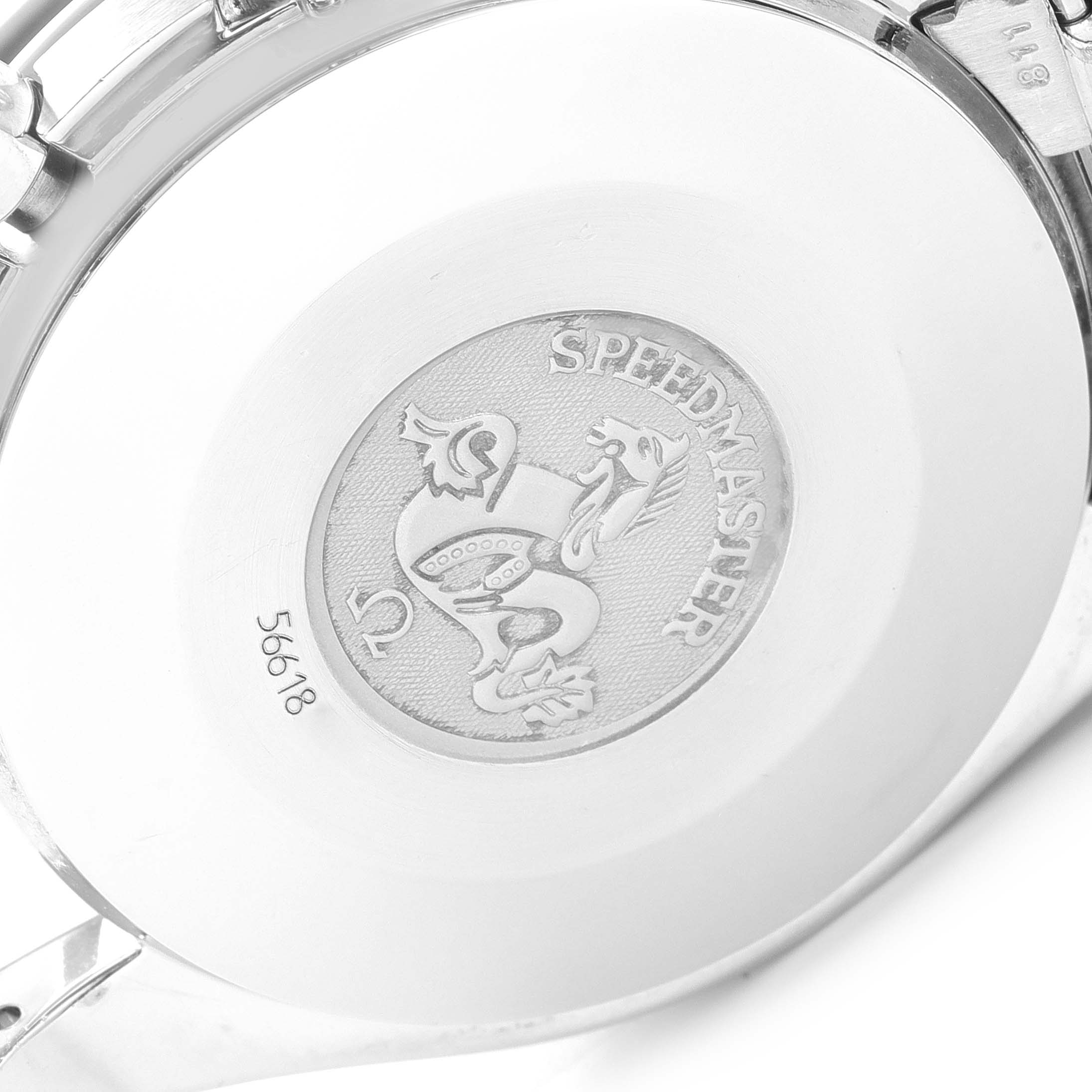 The image shows the back case of the Omega Speedmaster 3510.50.00 Men
s Stainless Steel Black Dial 3510.50.00 Men
s Stainless Steel Black Dial watch, highlighting the engraved emblem and serial number.