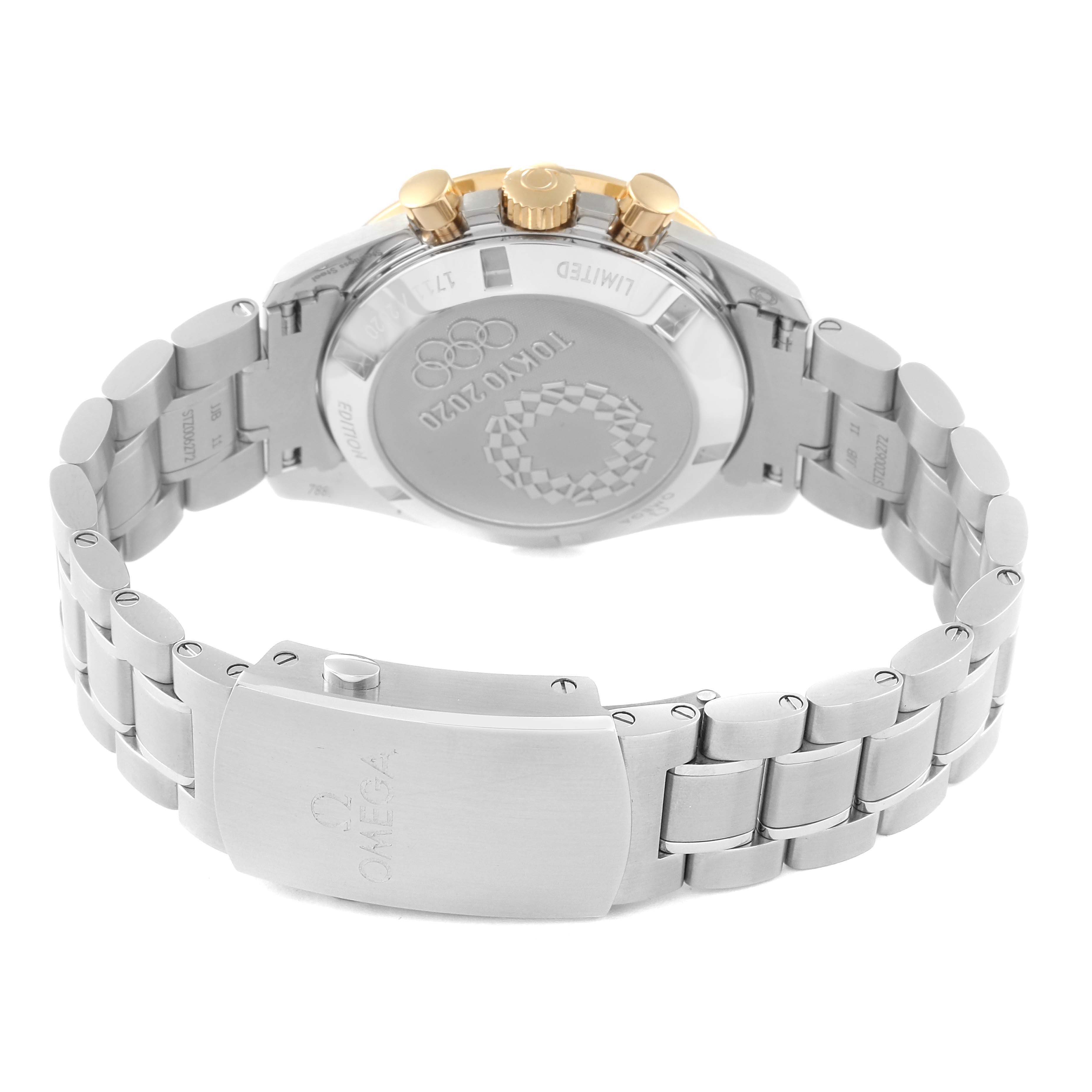 The image shows the back view and clasp of an Omega Speedmaster 522.20.42.30.01.001 Men's Stainless Steel Black Dial 522.20.42.30.01.001 Men's Stainless Steel Black Dial watch, featuring its Tokyo 2020 engraved caseback.