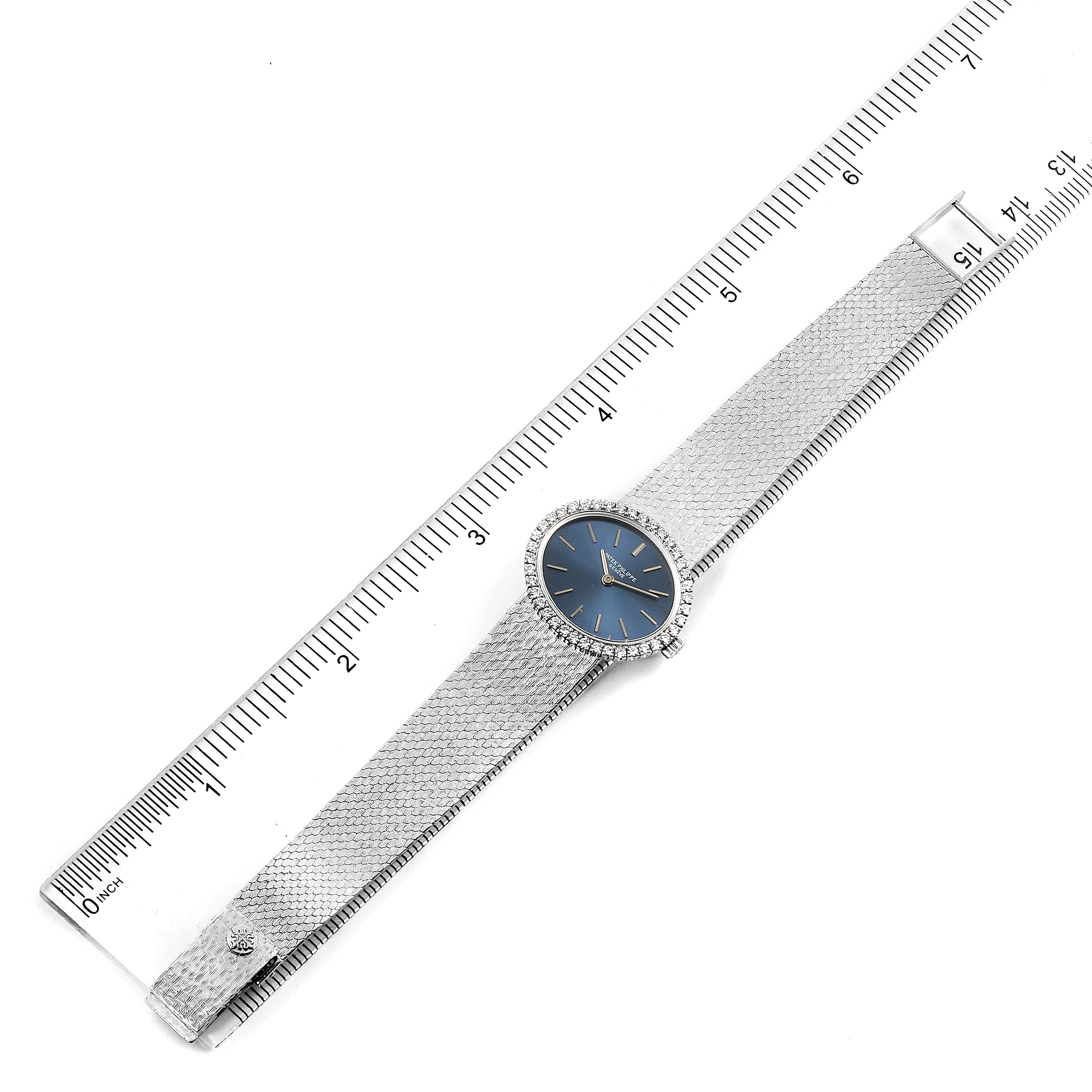 The image shows a top view of the Patek Philippe 4175 Women's White Gold Blue Dial 4175 Women's White Gold Blue Dial 4175 Blue Dial White Gold Diamond Cocktail Ladies Watch, including the full band alongside a ruler.
