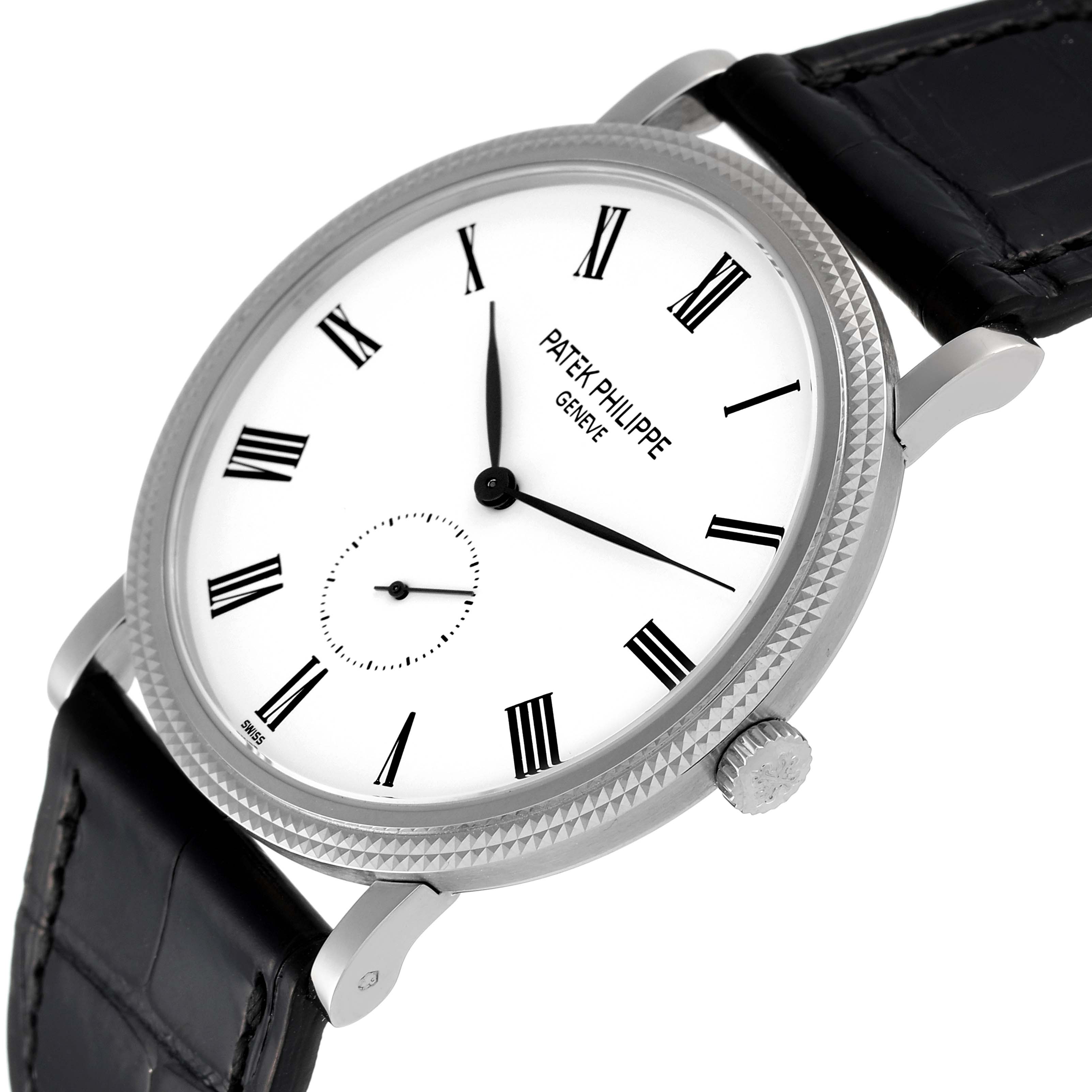 The image shows a Patek Philippe Calatrava 5119G Men
s White Gold White Dial 5119G Men
s White Gold White Dial watch from a three-quarter angle, highlighting the face, bezel, crown, and leather strap.