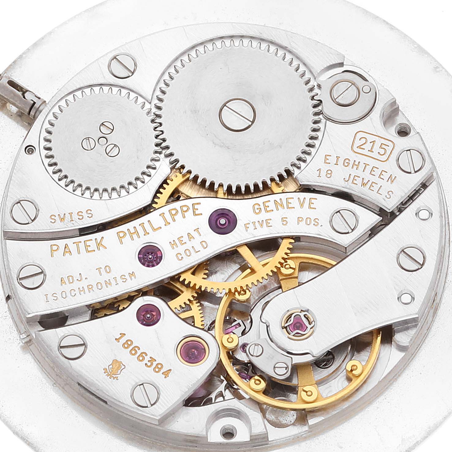 This image shows the movement and inner mechanisms of a Patek Philippe Calatrava 3919J Men's Yellow Gold White Dial 3919J Men's Yellow Gold White Dial watch model.