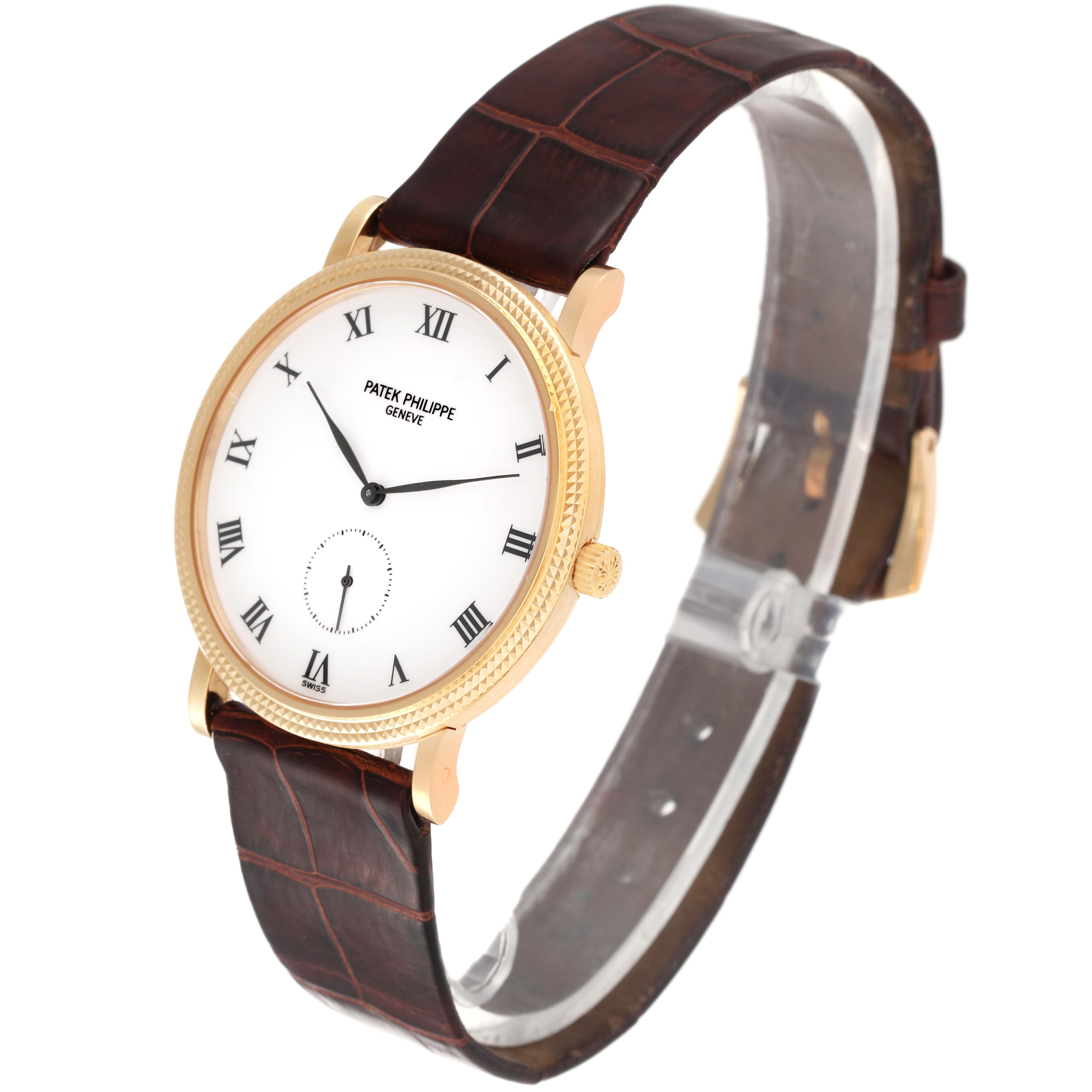 The image shows a Patek Philippe Calatrava 3919J Men's Yellow Gold White Dial 3919J Men's Yellow Gold White Dial watch at an angled side view, displaying its face and leather strap.