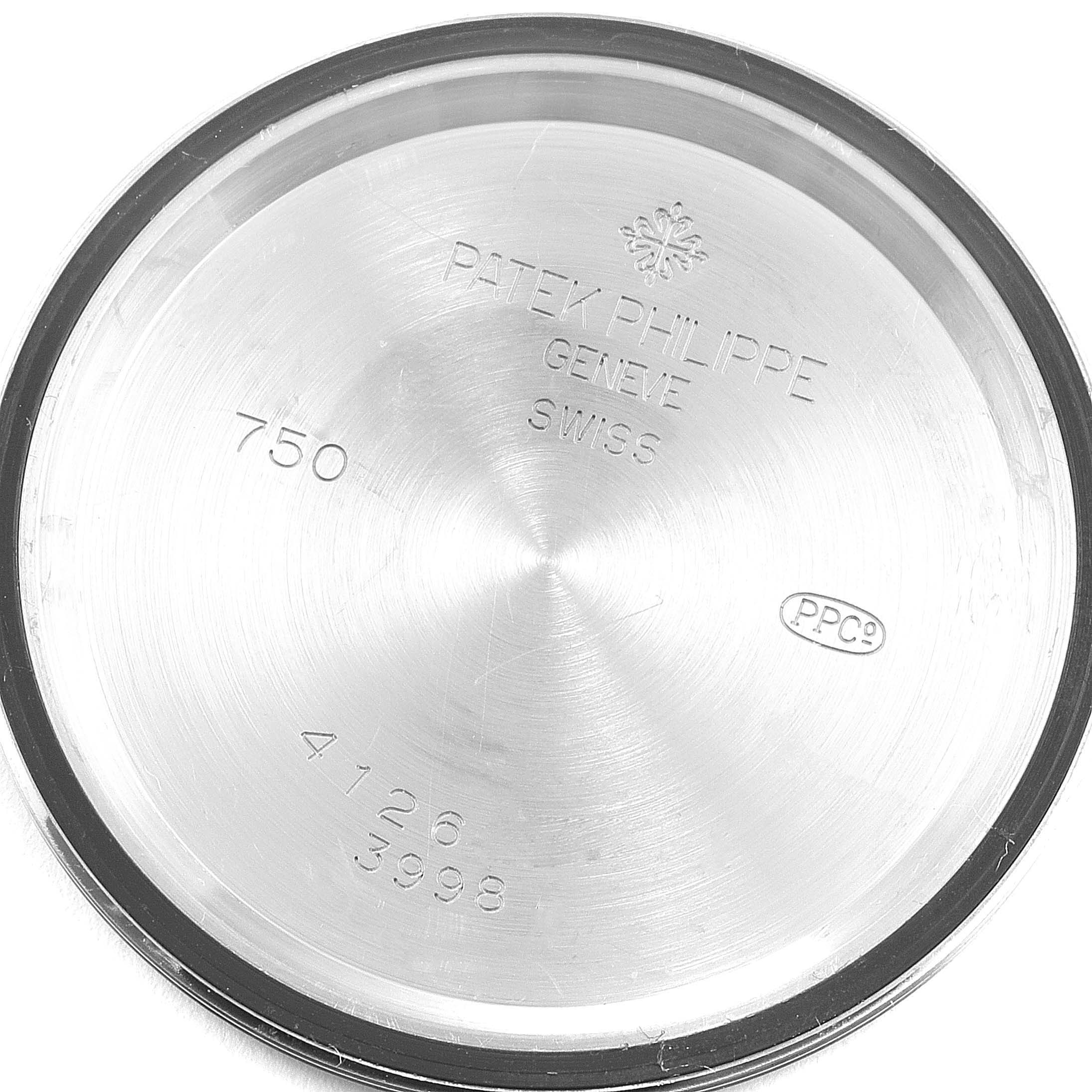This is a close-up image of the back case of a Patek Philippe Calatrava 3998G Men's White Gold Silver Dial 3998G Men's White Gold Silver Dial watch, showing the engraved details.