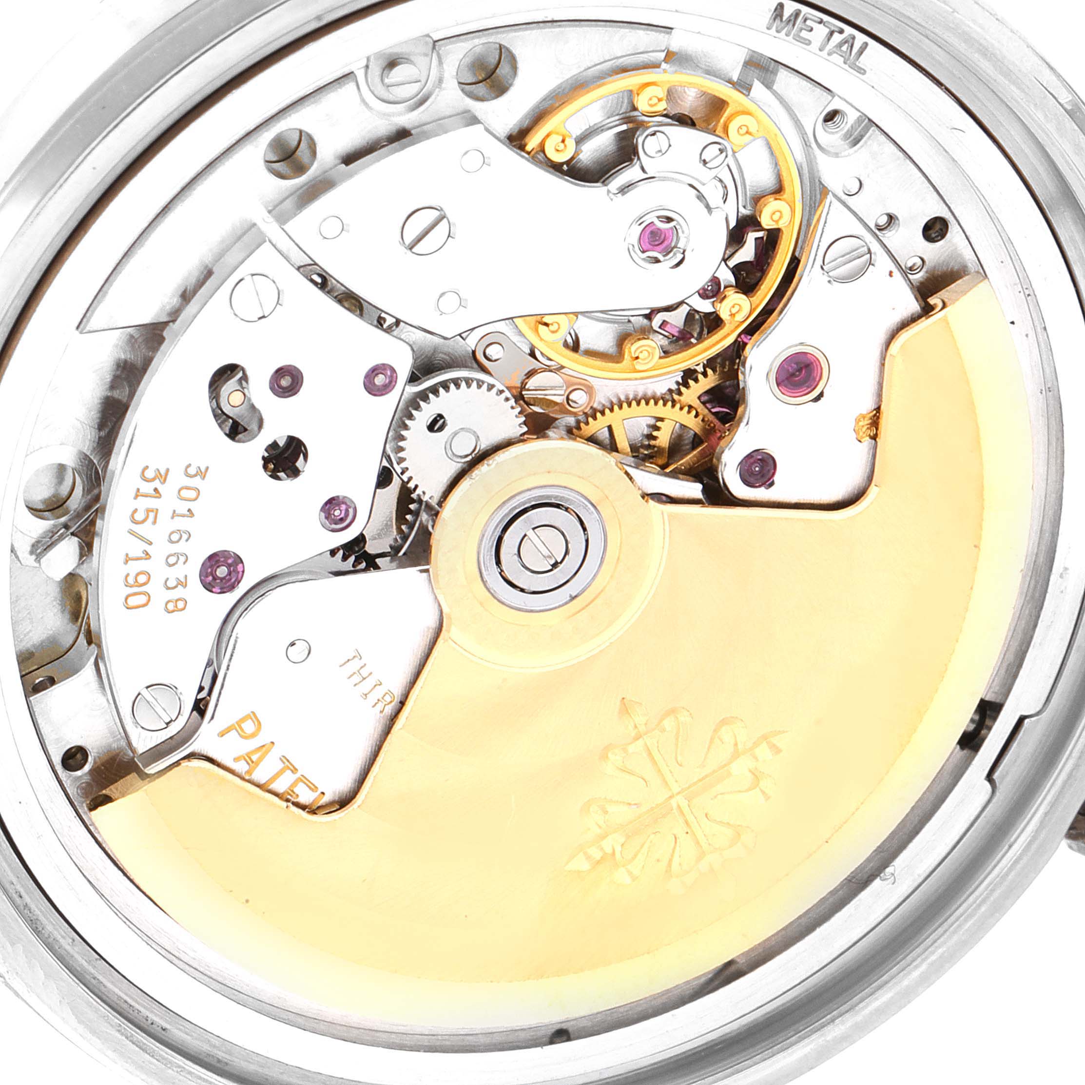 This image shows the intricate movement and mechanism of a Patek Philippe Calatrava 3998G Men's White Gold Silver Dial 3998G Men's White Gold Silver Dial model from a rear angle.