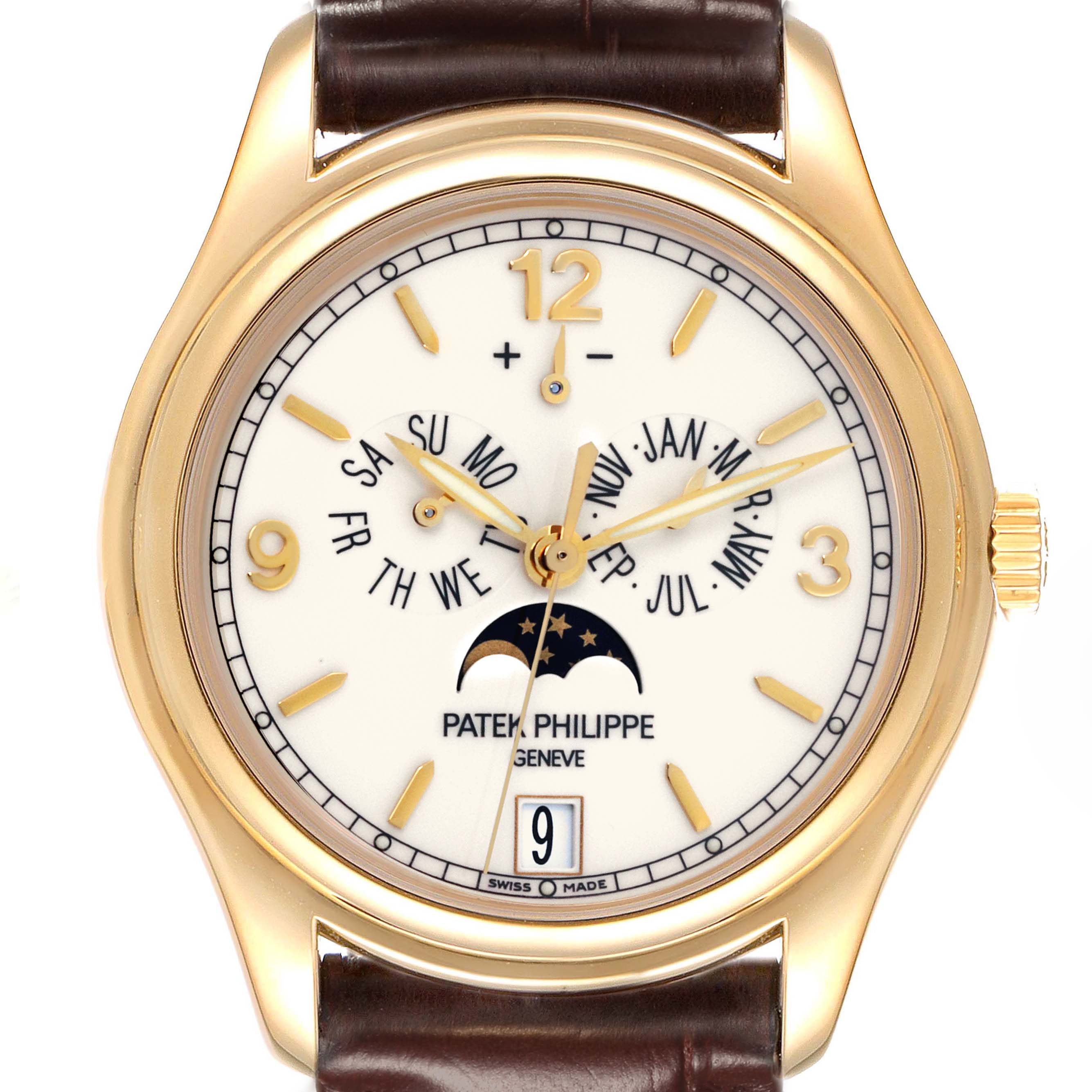 The Patek Philippe Complications 5146J Men's Yellow Gold Beige Dial 5146J Men's Yellow Gold Beige Dial watch is shown from a frontal angle, displaying its dial, moon phase, and calendar complications.