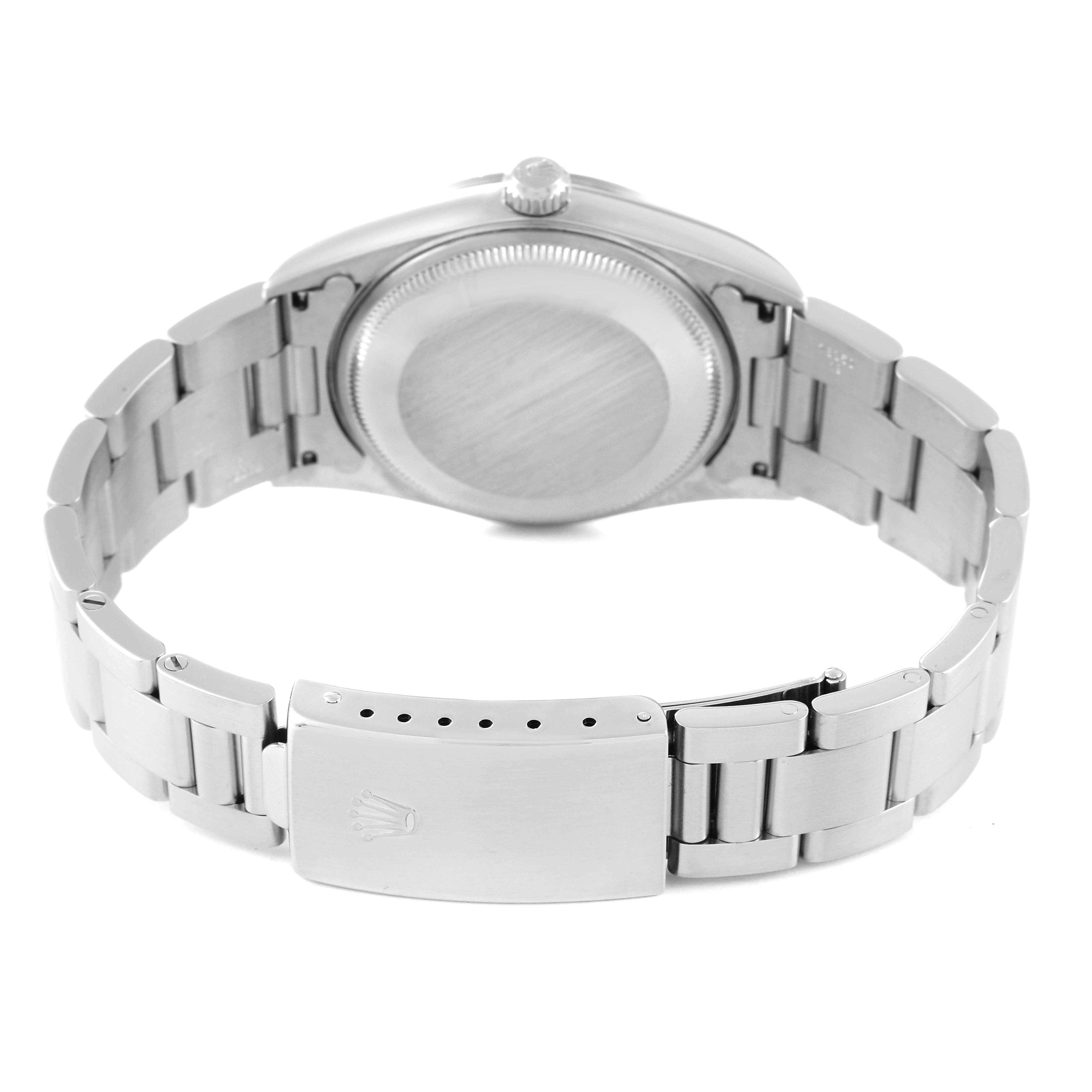 This image shows the backside and bracelet clasp of the Rolex Air-King 14000 Men's Stainless Steel Pink Dial 14000 Men's Stainless Steel Pink Dial watch.