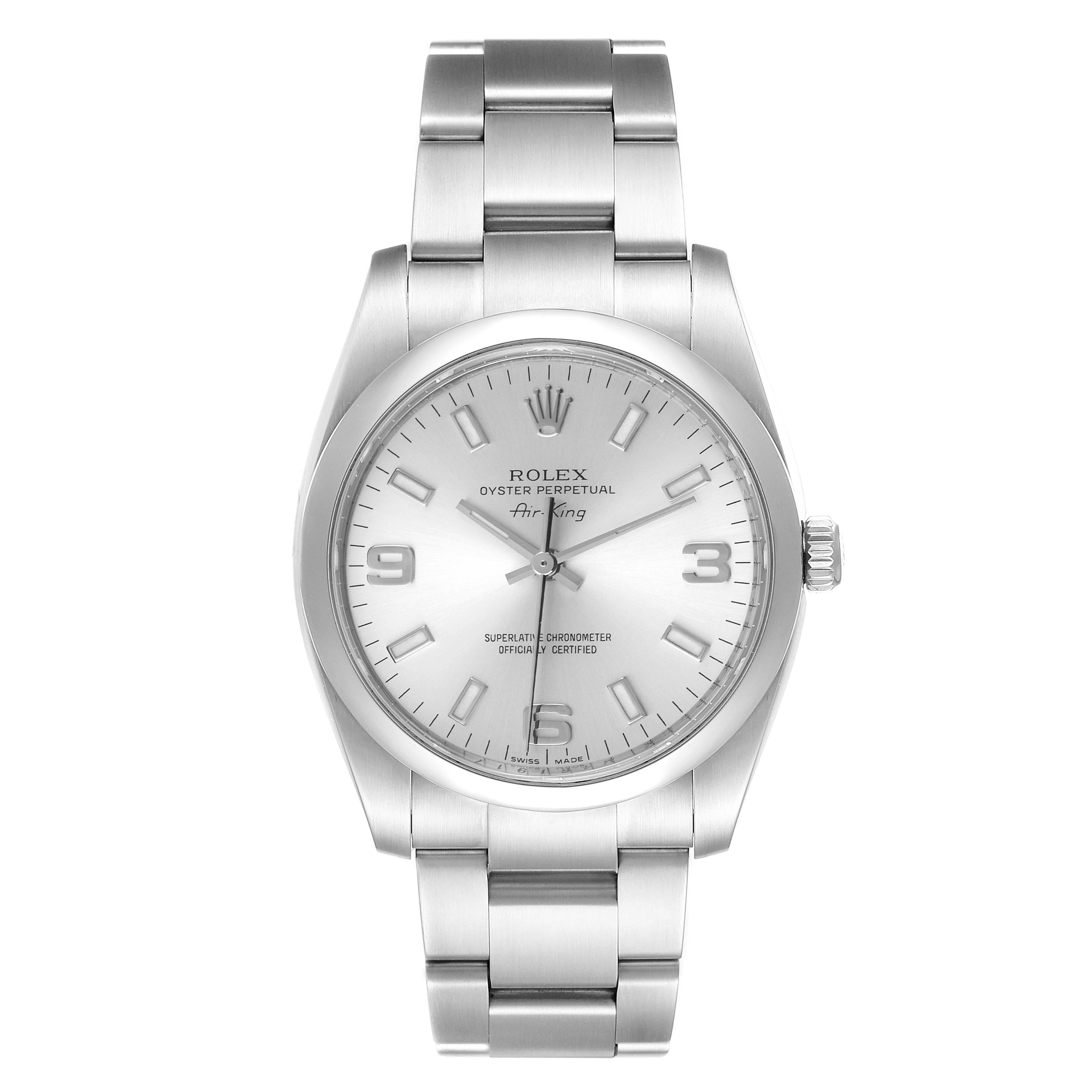 The Rolex Air-King 114200 Men's Stainless Steel Silver Dial 114200 Men's Stainless Steel Silver Dial watch is shown from a front angle, displaying its face, bezel, and bracelet.