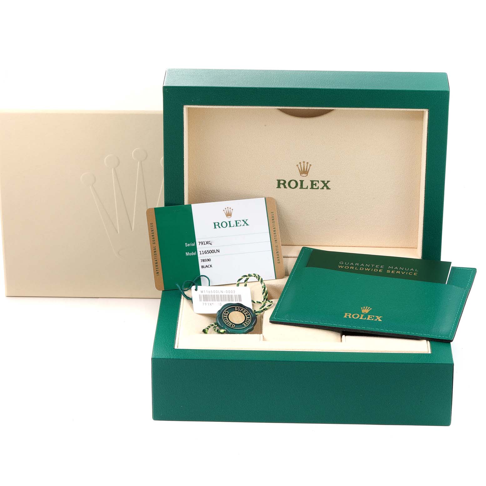 The image shows accessories for a Rolex Daytona 116500 Men
s Stainless Steel Black Dial 116500 Men
s Stainless Steel Black Dial, including the box, warranty card, manual, and tags.