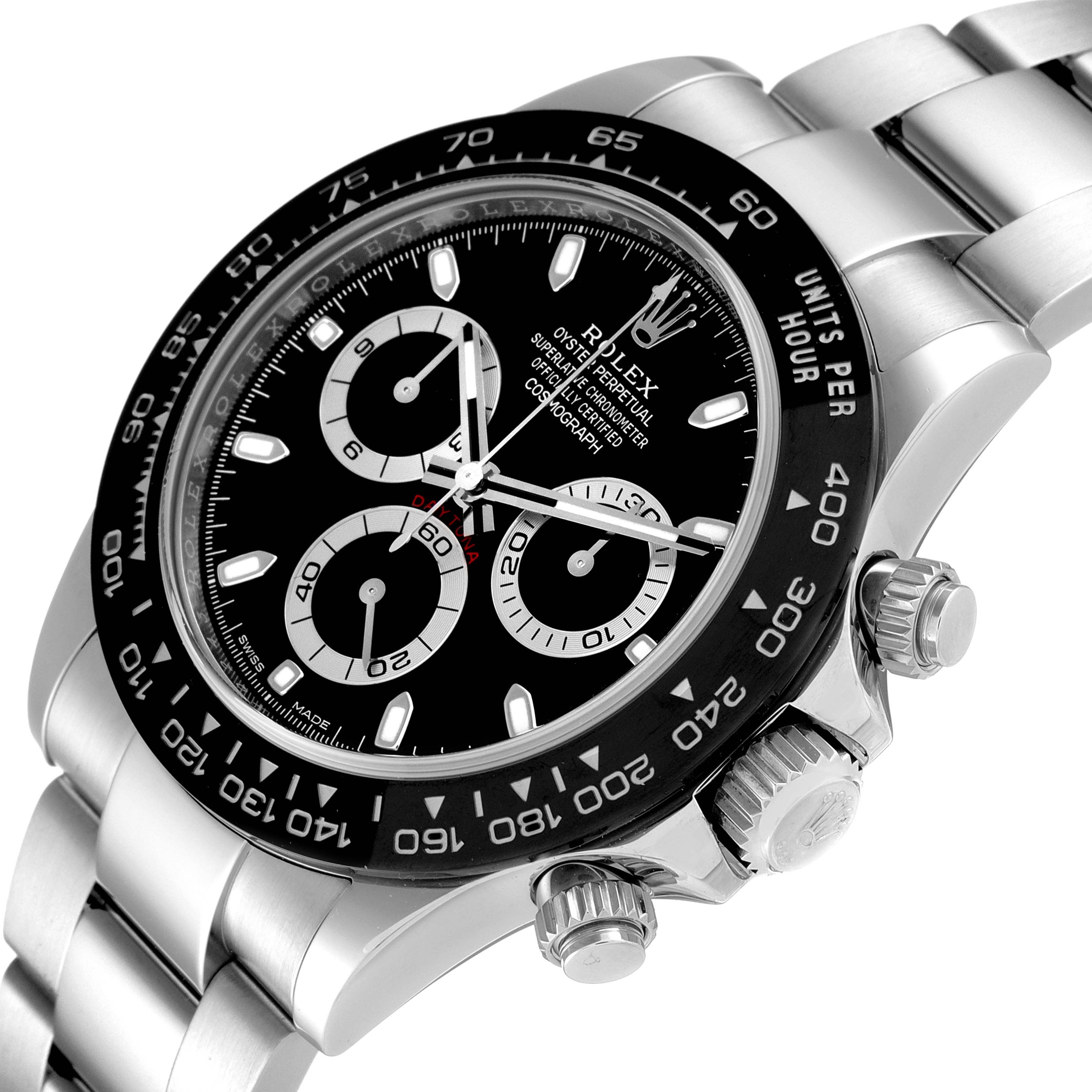 The image shows a close-up, angled view of the Rolex Daytona 116500 Men
s Stainless Steel Black Dial 116500 Men
s Stainless Steel Black Dial watch, displaying its dial, bezel, pushers, and part of the bracelet.